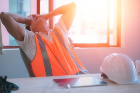 an engineer overwhelmed from work