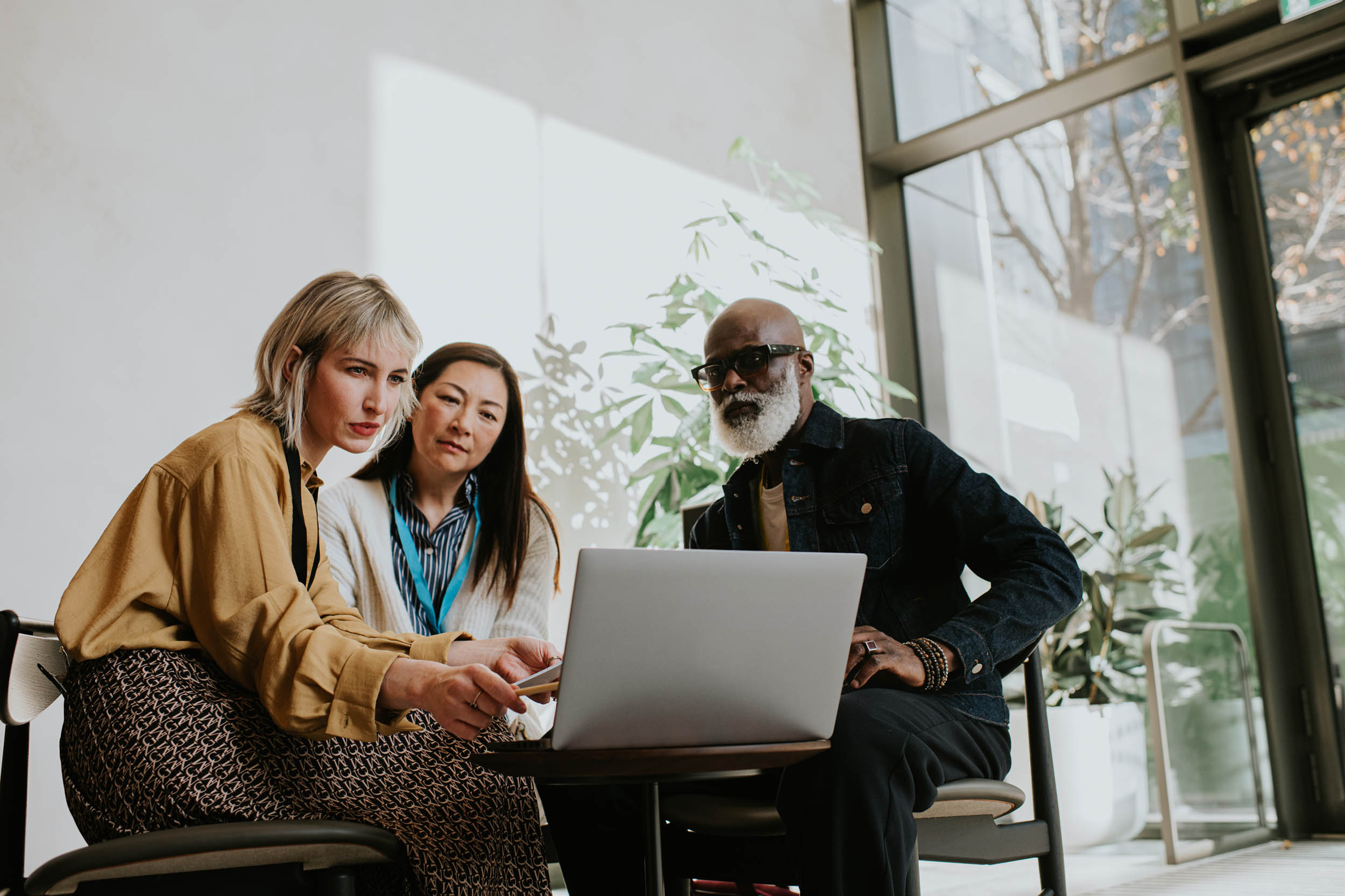 Business owners reviewing Quickbooks