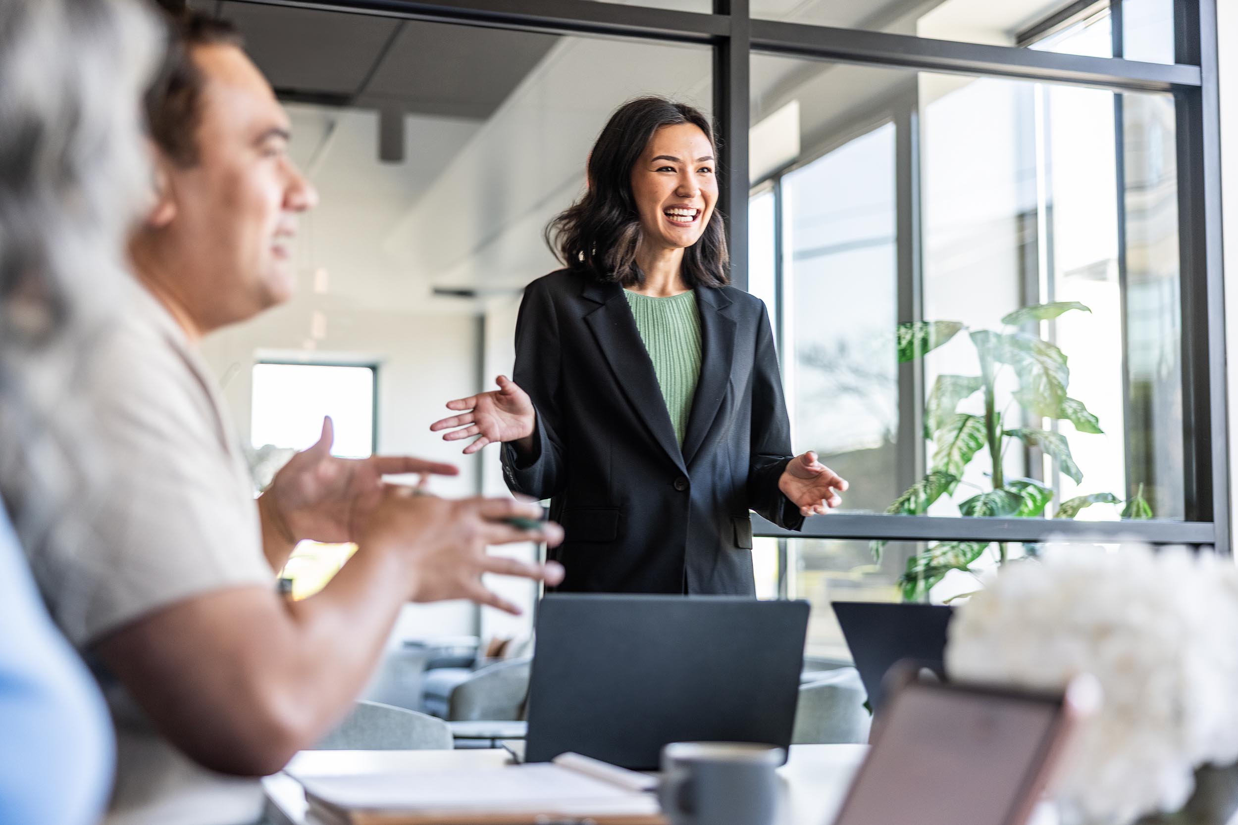 Experienced consultant presenting in meeting