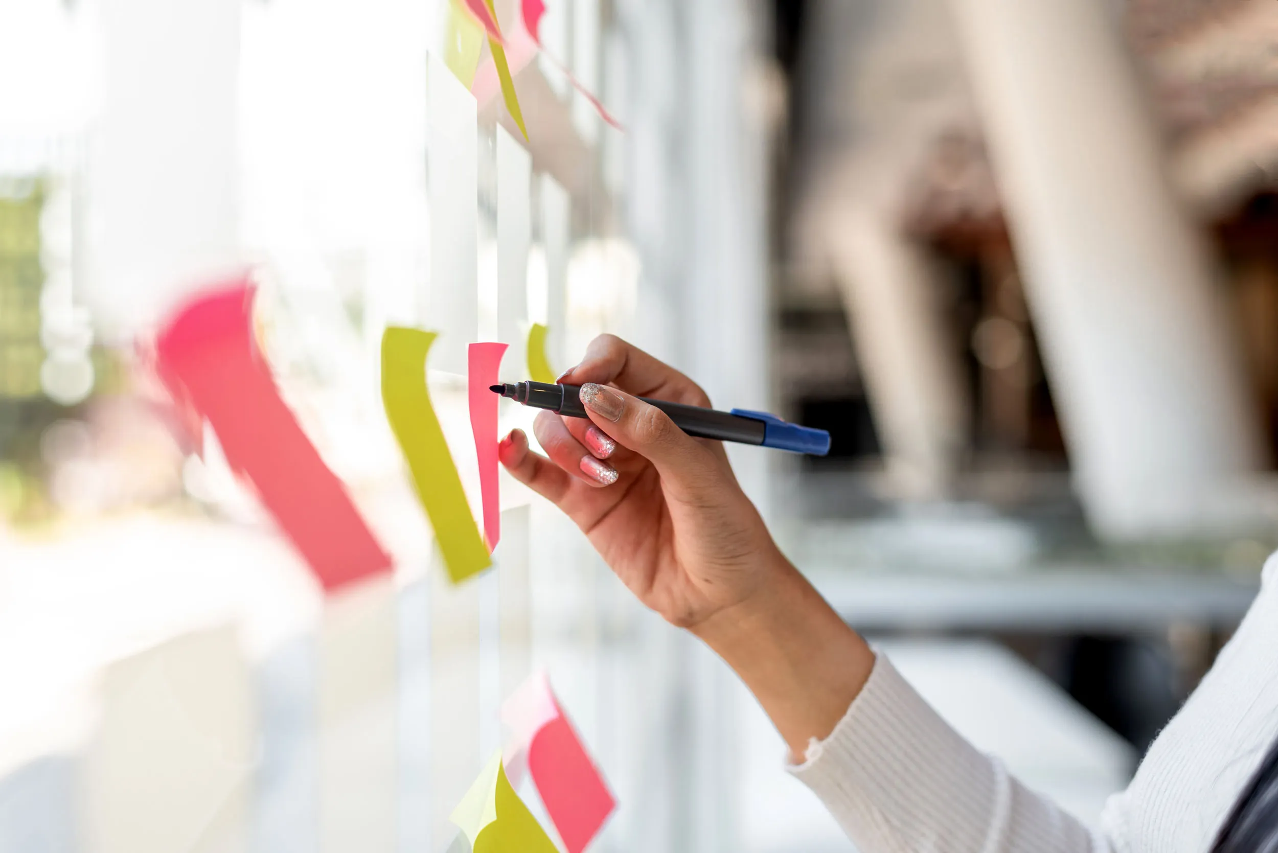 brainstorming on sticky notes