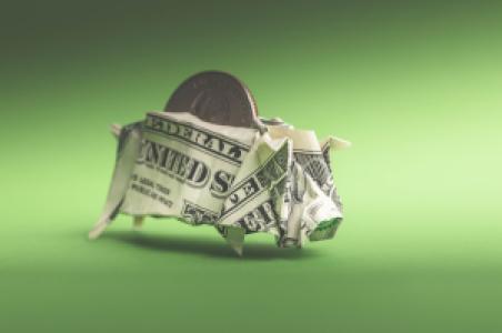 a origami piggy bank make from money