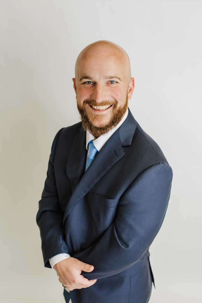 headshot of Adam Kee