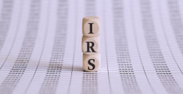 IRS wooden blocks on a spreadsheet