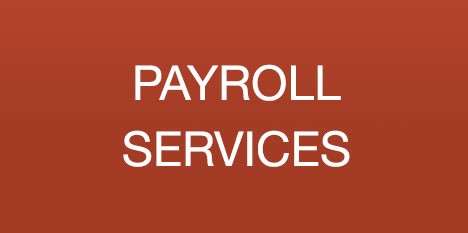 A person reviewing payroll documents.