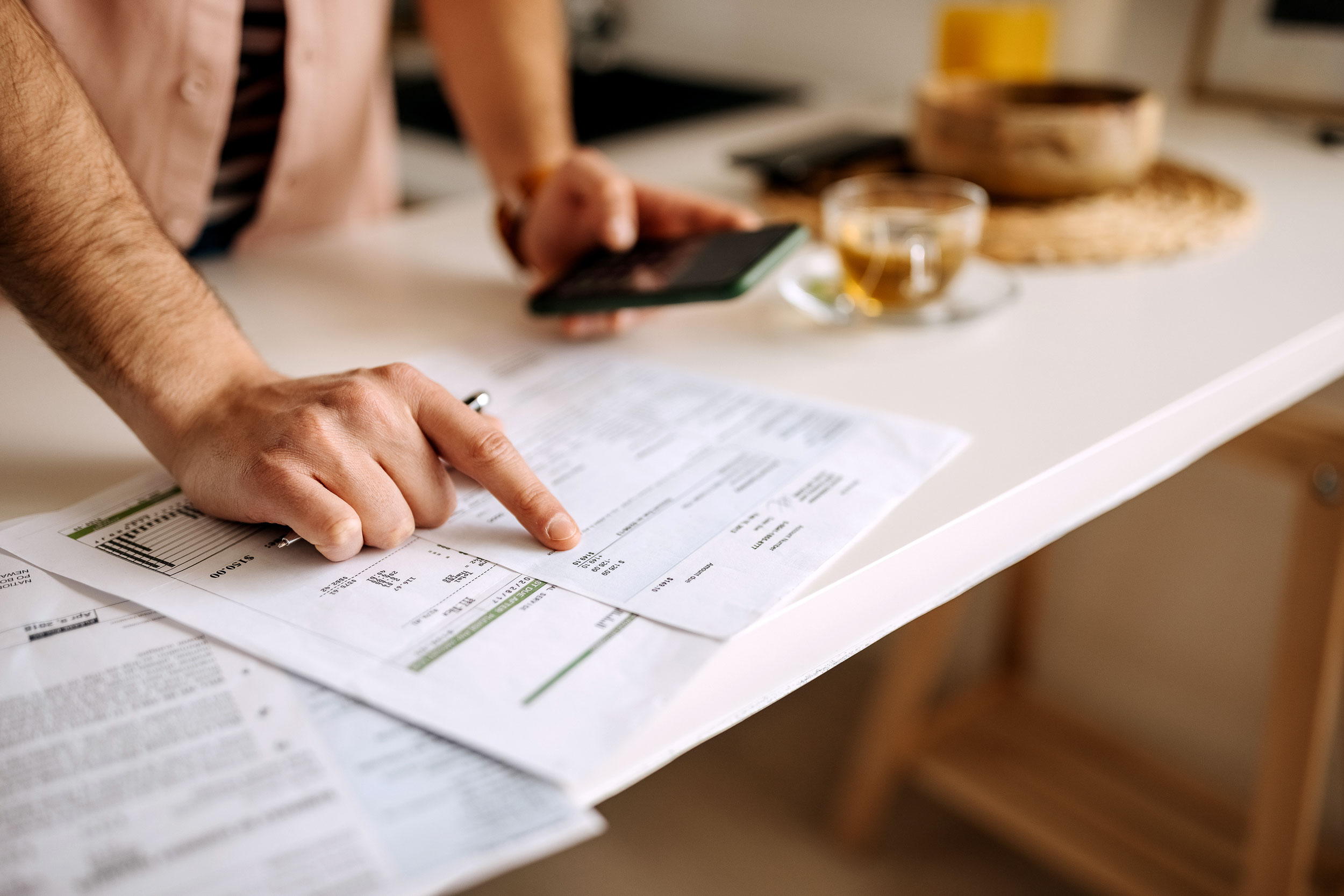 Small business owner reviewing financial statements
