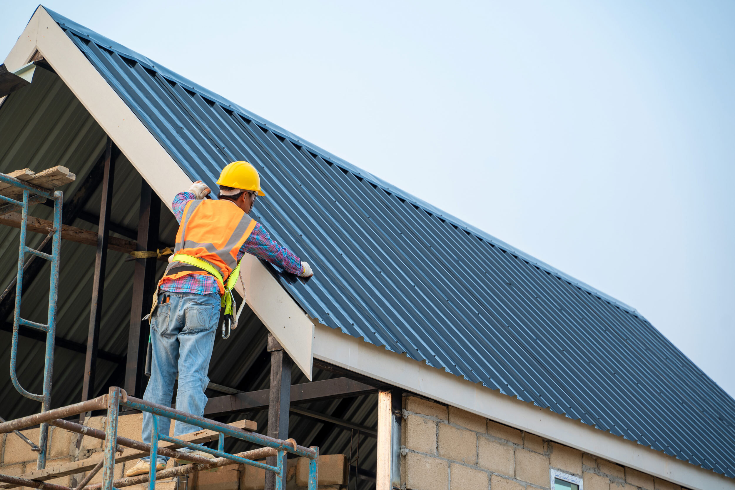 construction worker working on a roof