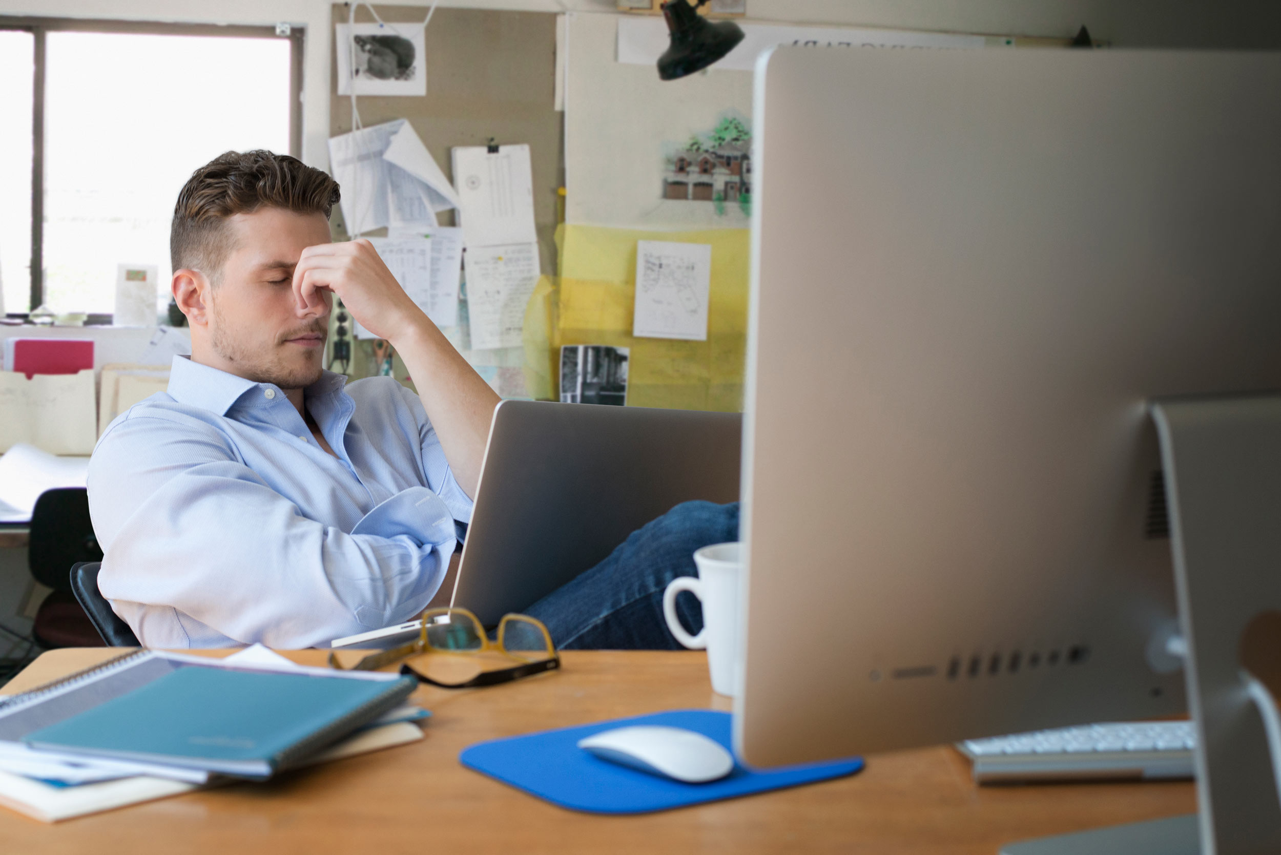Frustrated business owner looking at deadlines