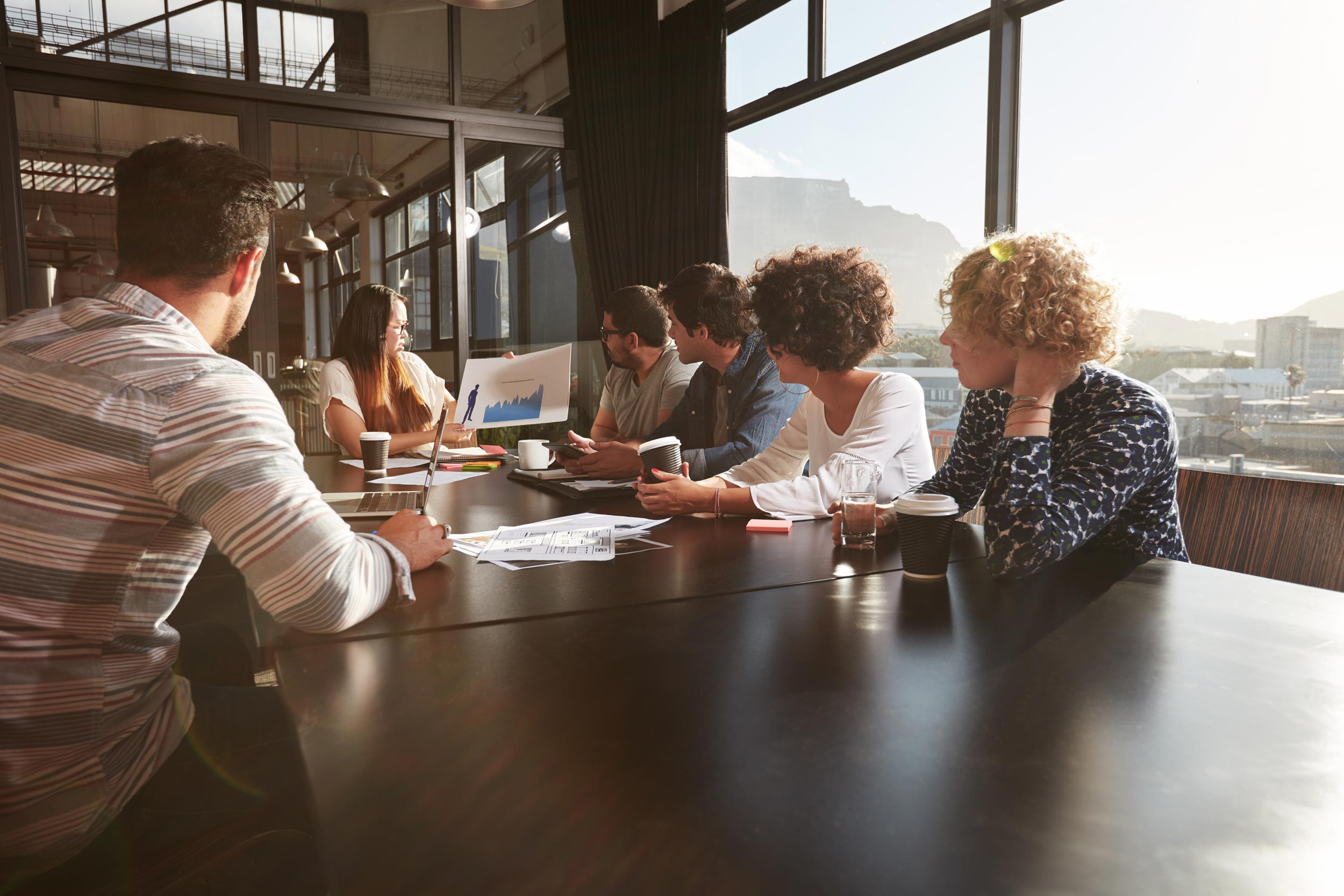 Coworkers in a conference room having a business meeting.