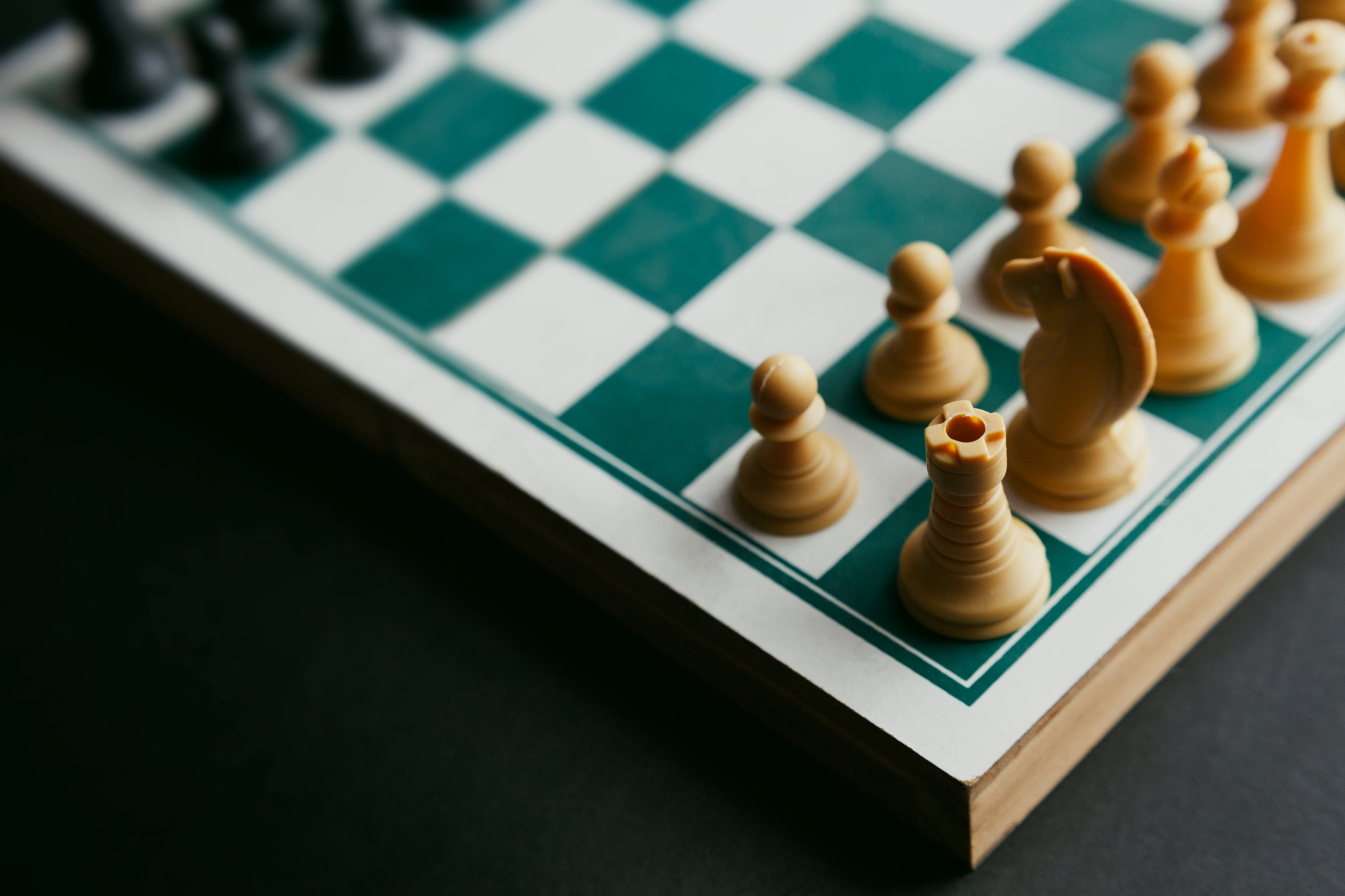 chess pieces on a checkerboard