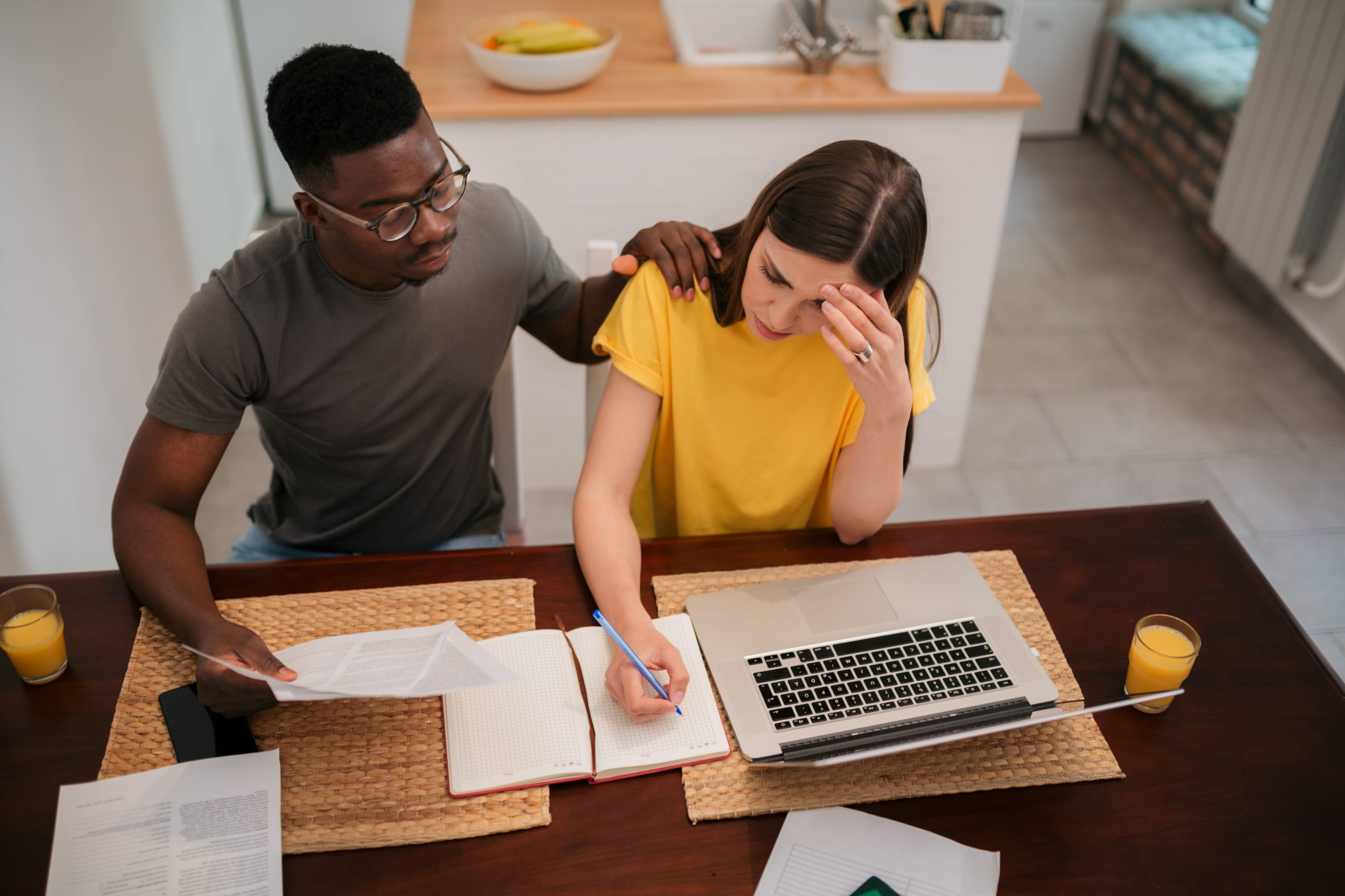 a couple stressed out about home finances