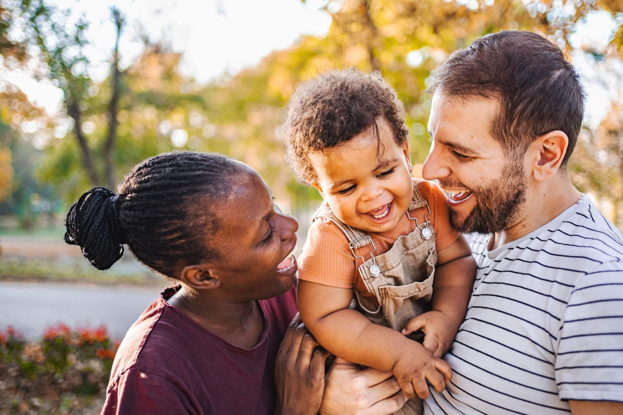 happy parents and child spending time together