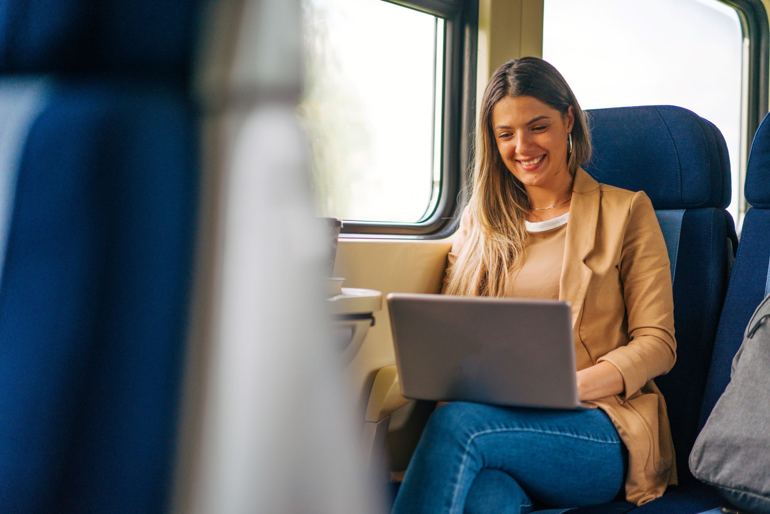 a businessperson traveling on a train
