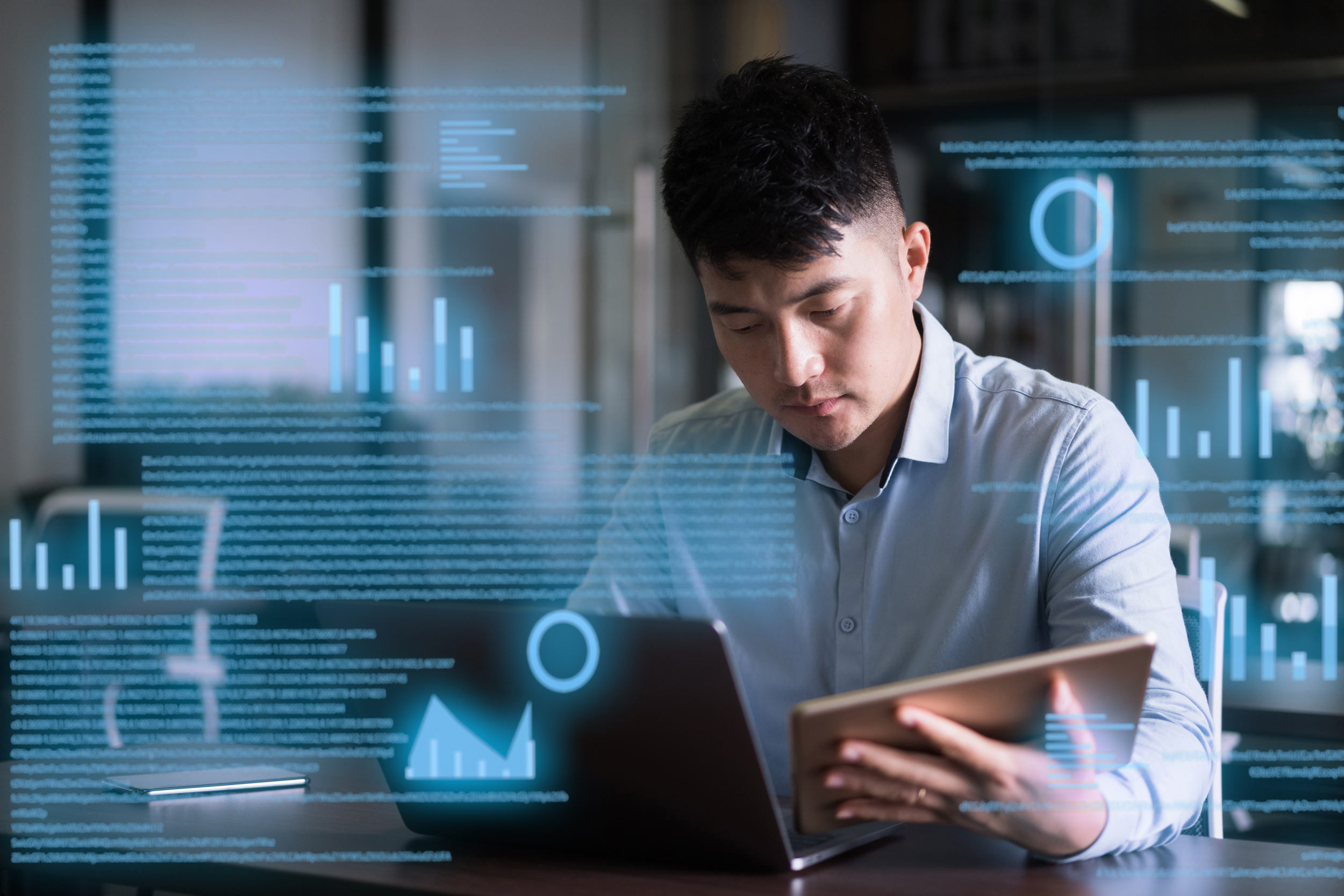 man uses laptop on virtual visual screen