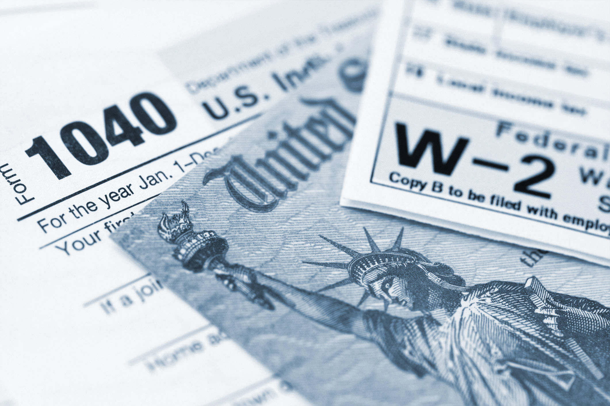tax form 1040 and W-2 wages statement
