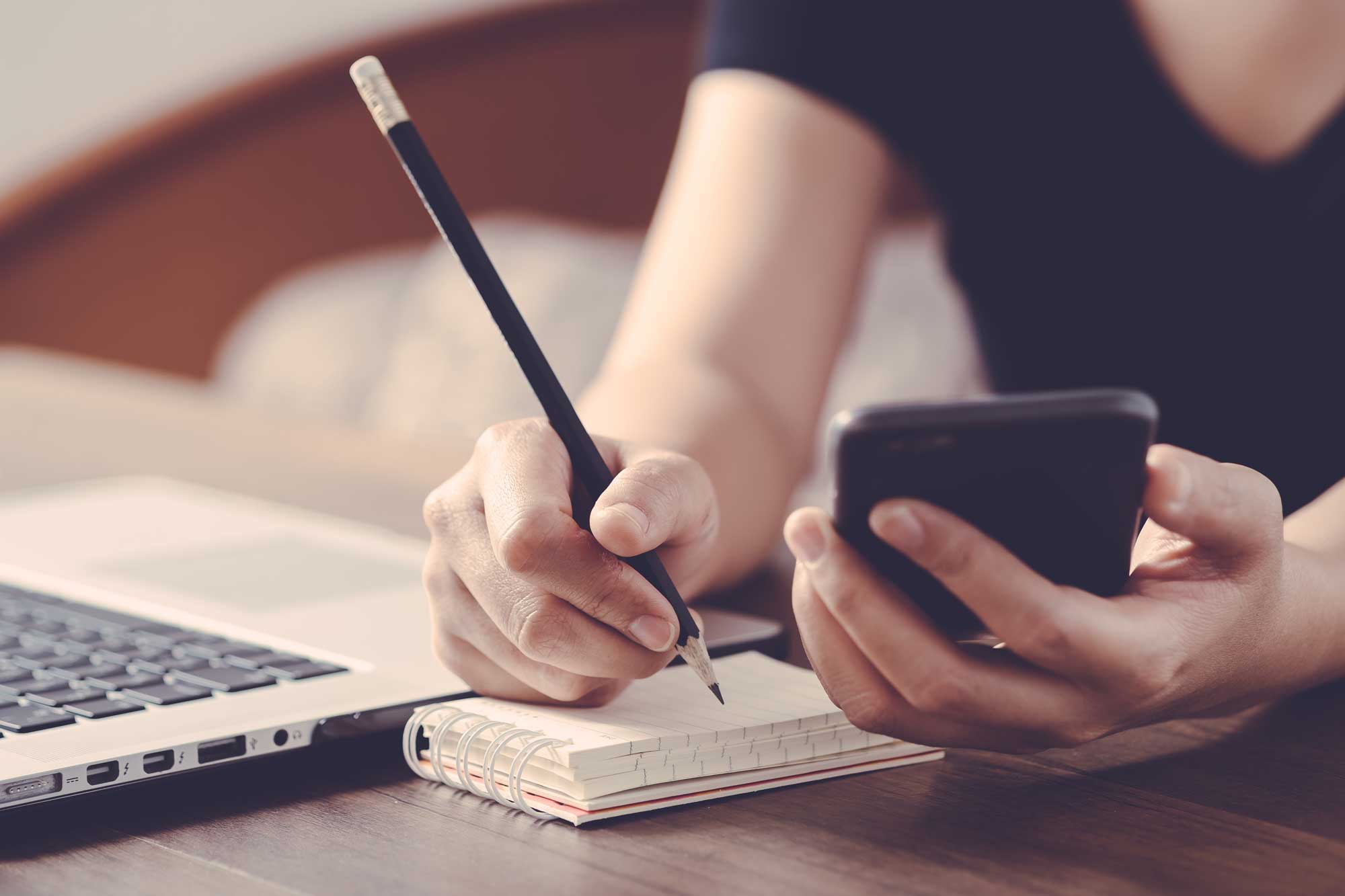 Tax planning notepad with calculations