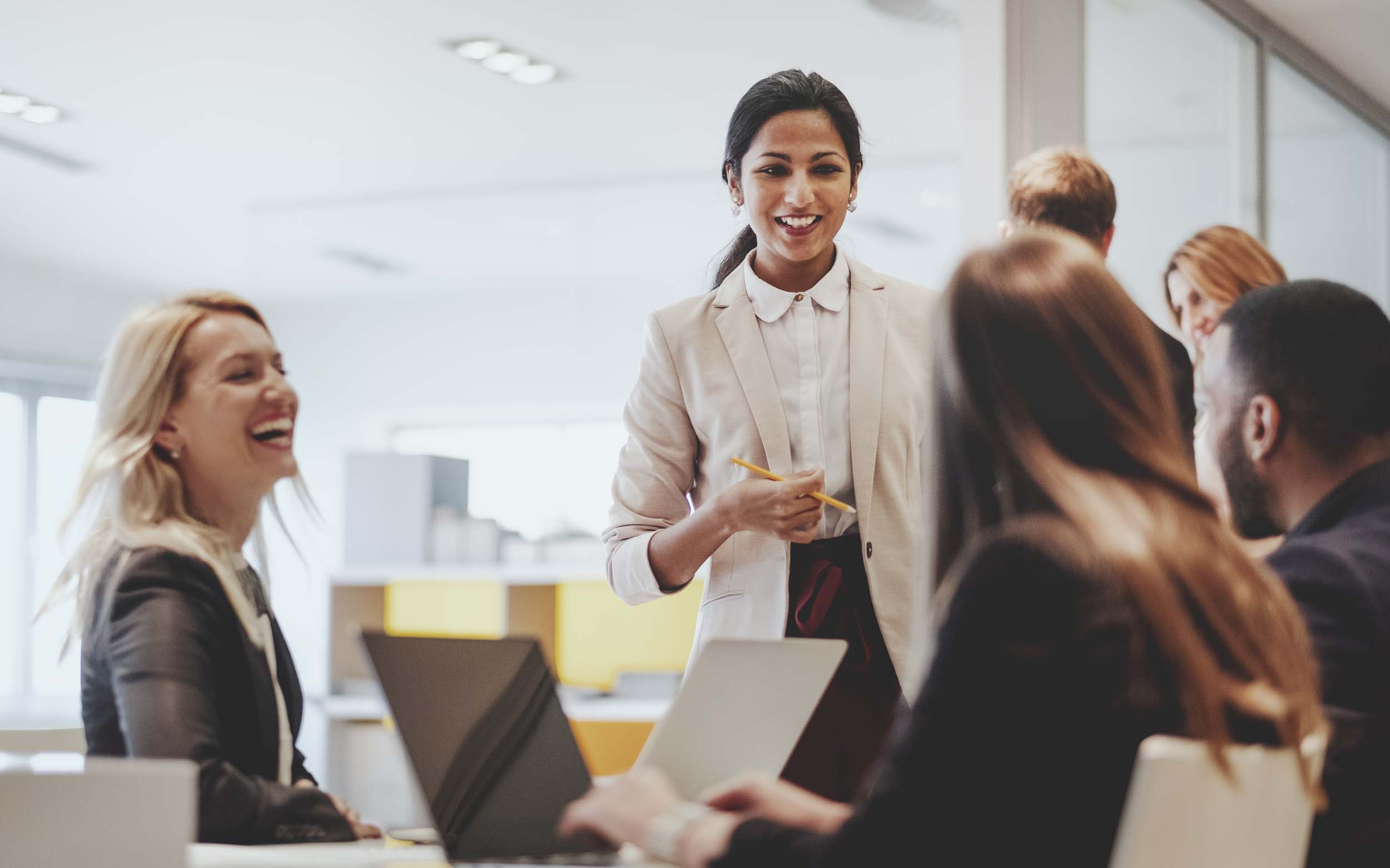 a group of people feels happy in the meeting