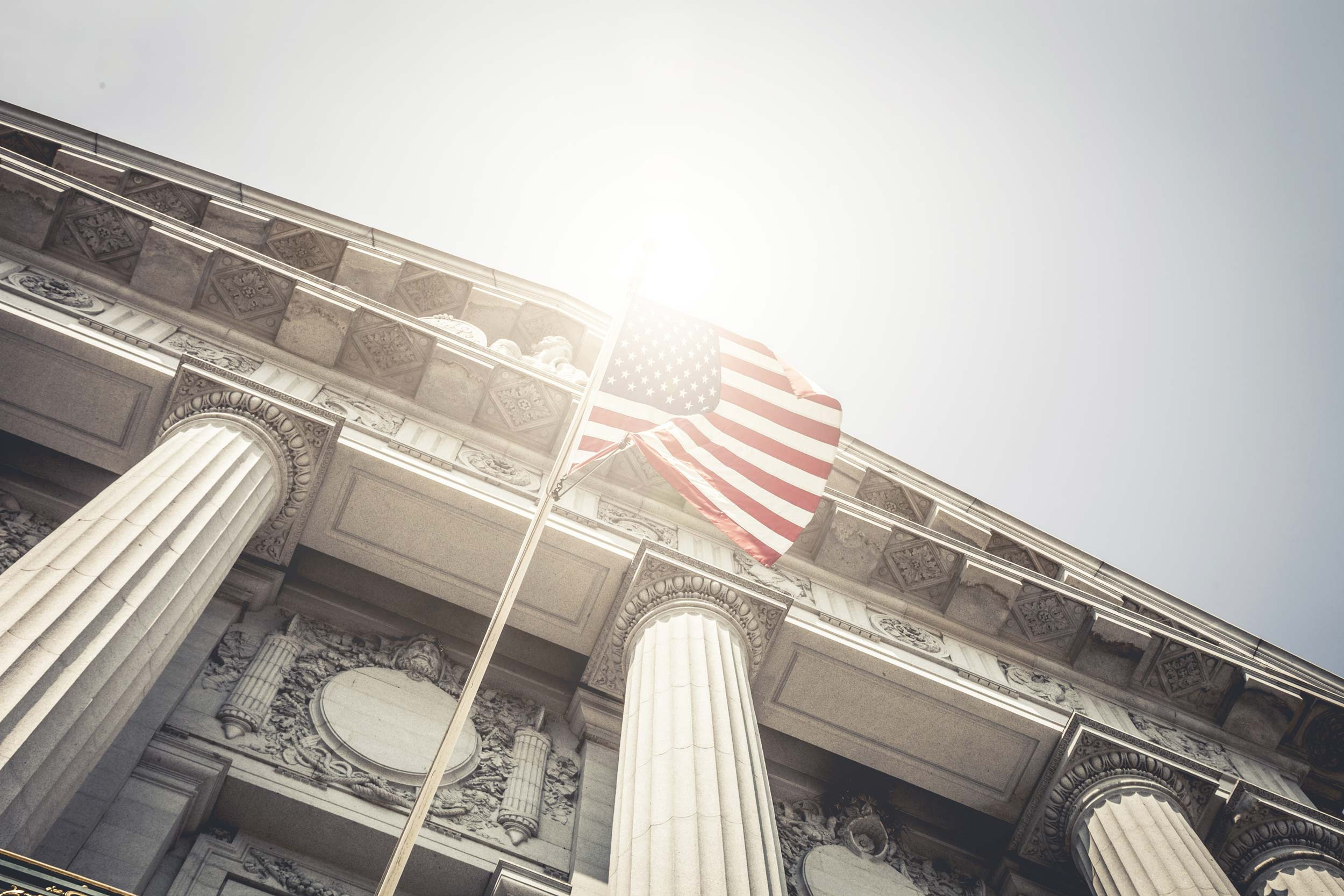 flag hanging on government building