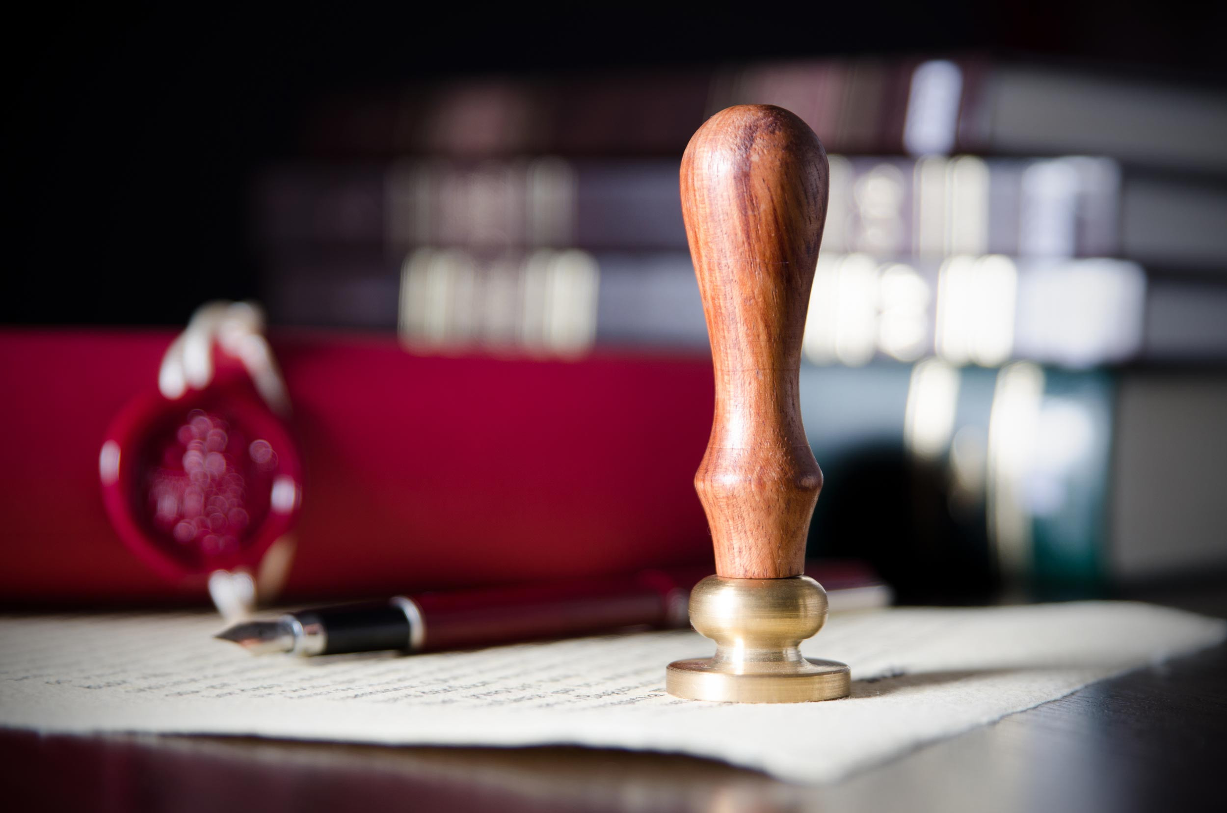 notary seal on the paper with pen
