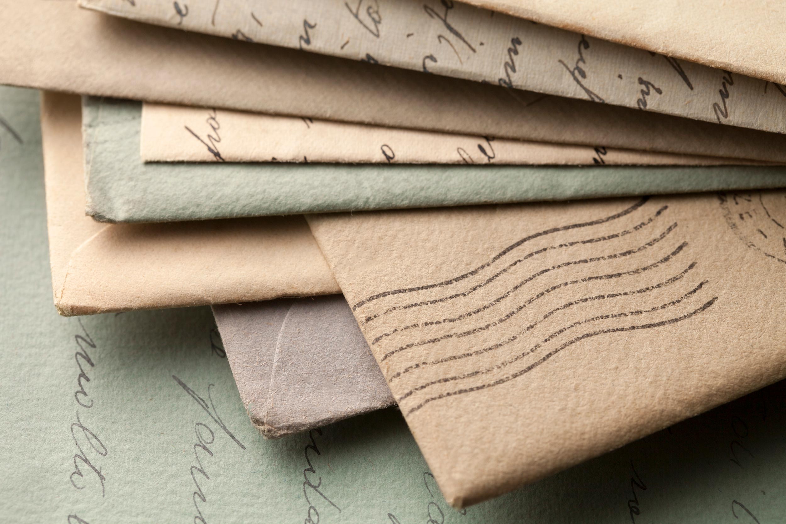 Close up of mail and tax documents representing financial compliance