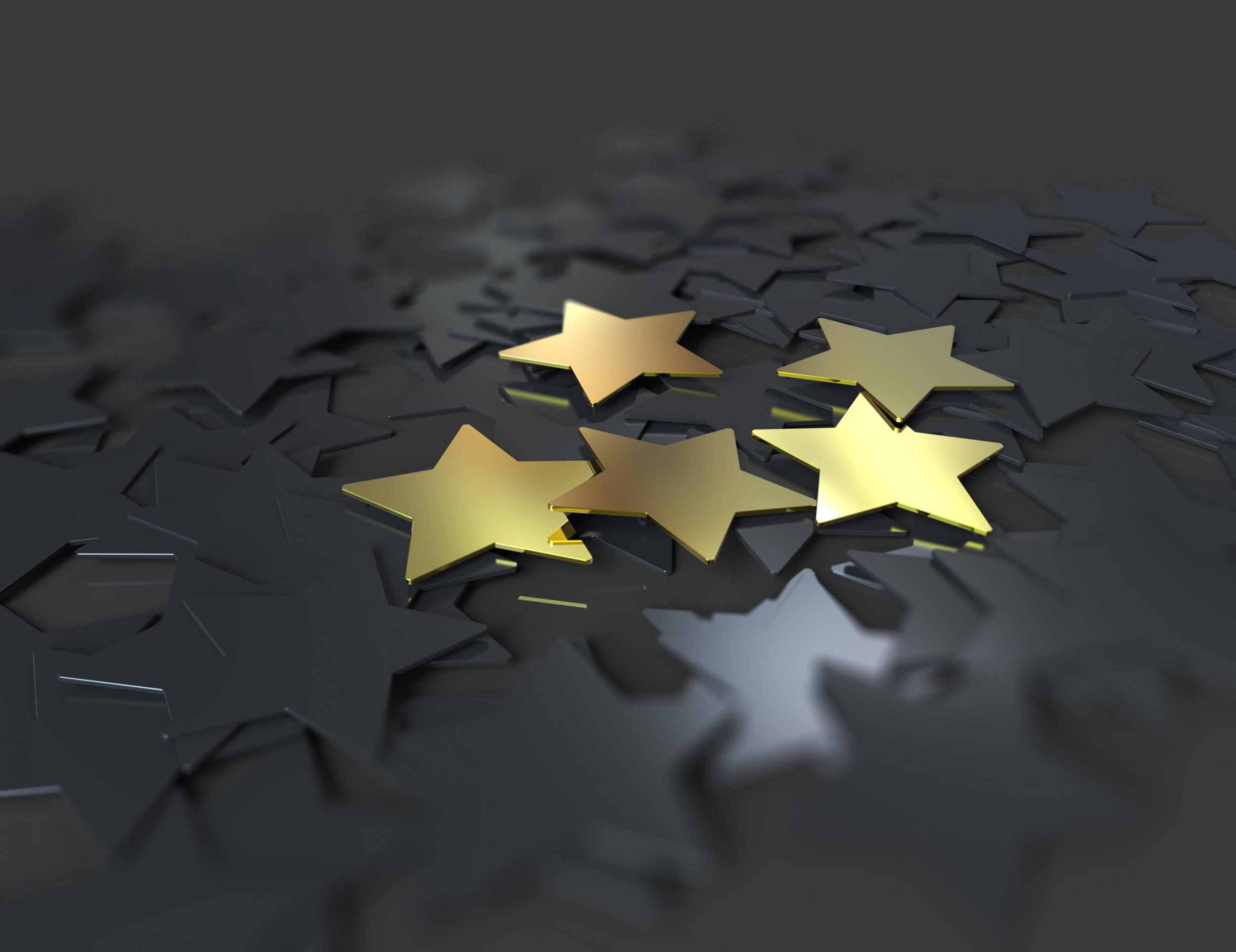 black stars background with five gold stars