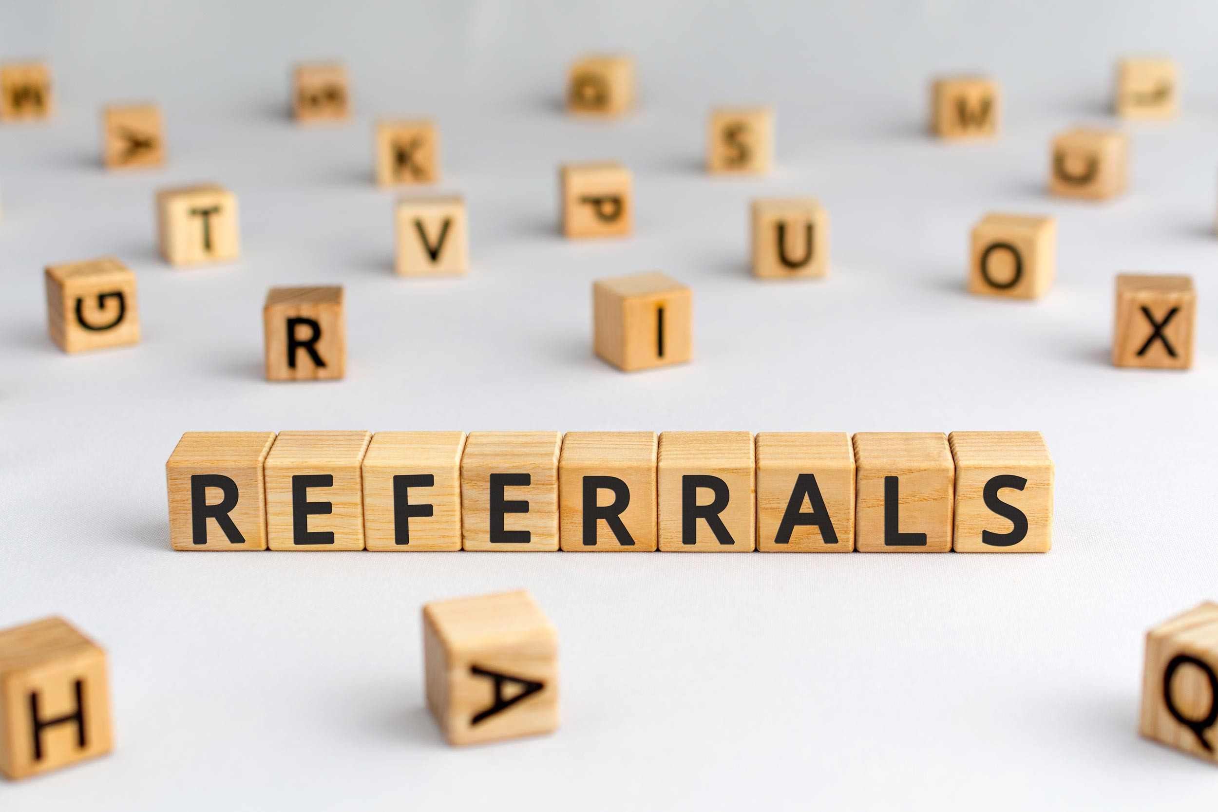 wooden blocks arrange the referrals