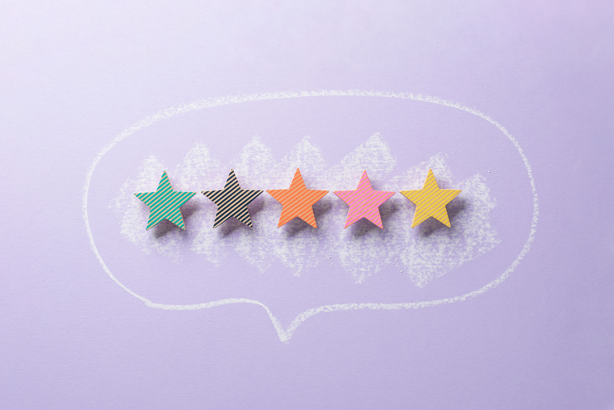 violet background with five color star chat bubble