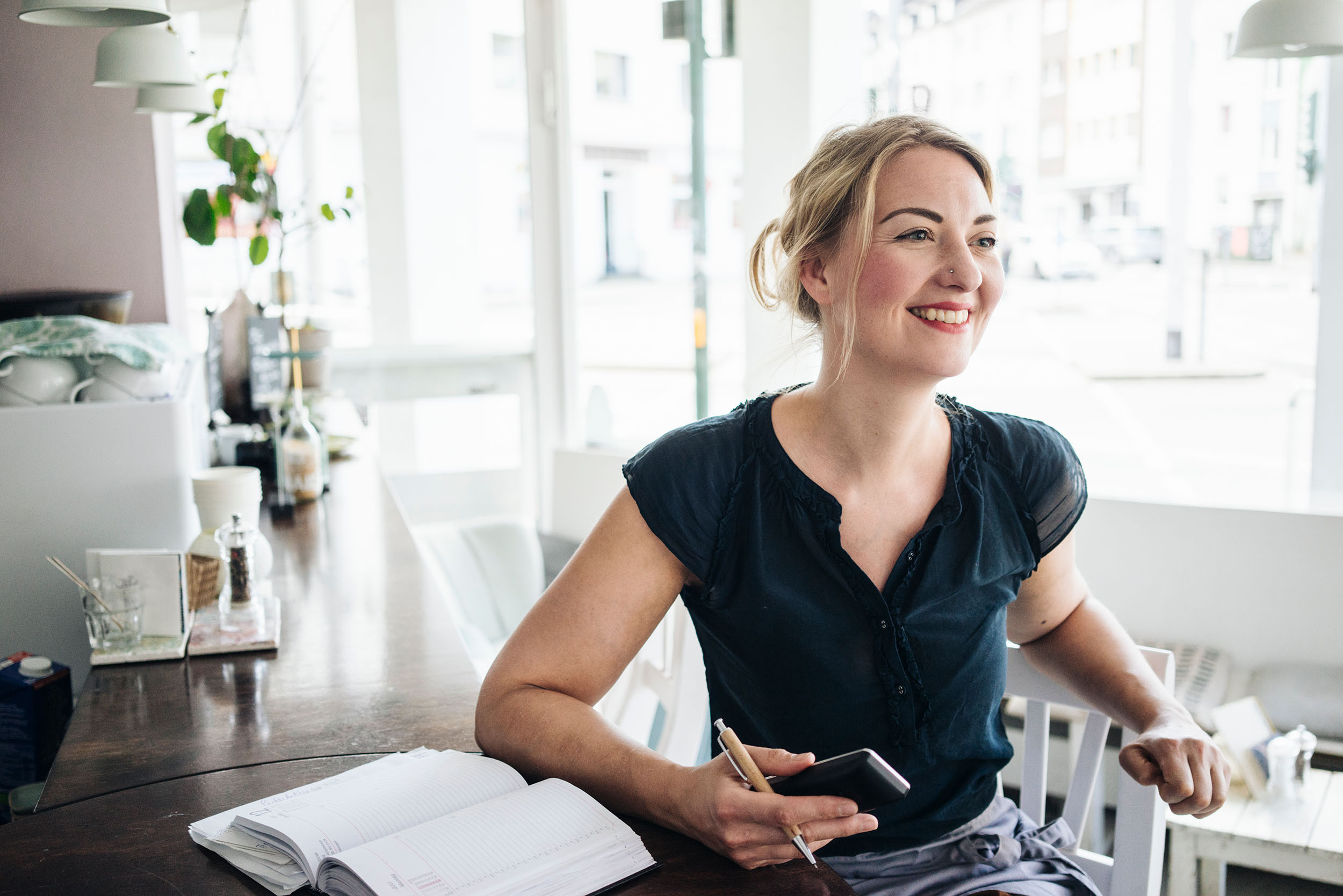 a small business owner with the bookkeeping records