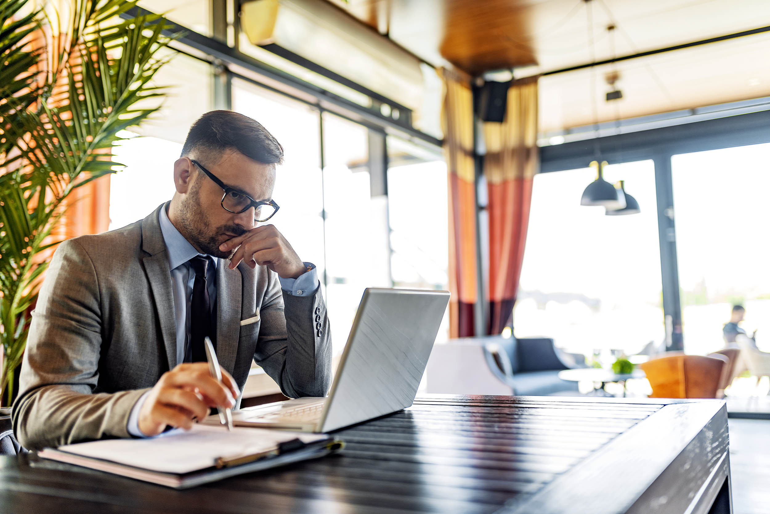 Stressed individual managing complex family financial decisions