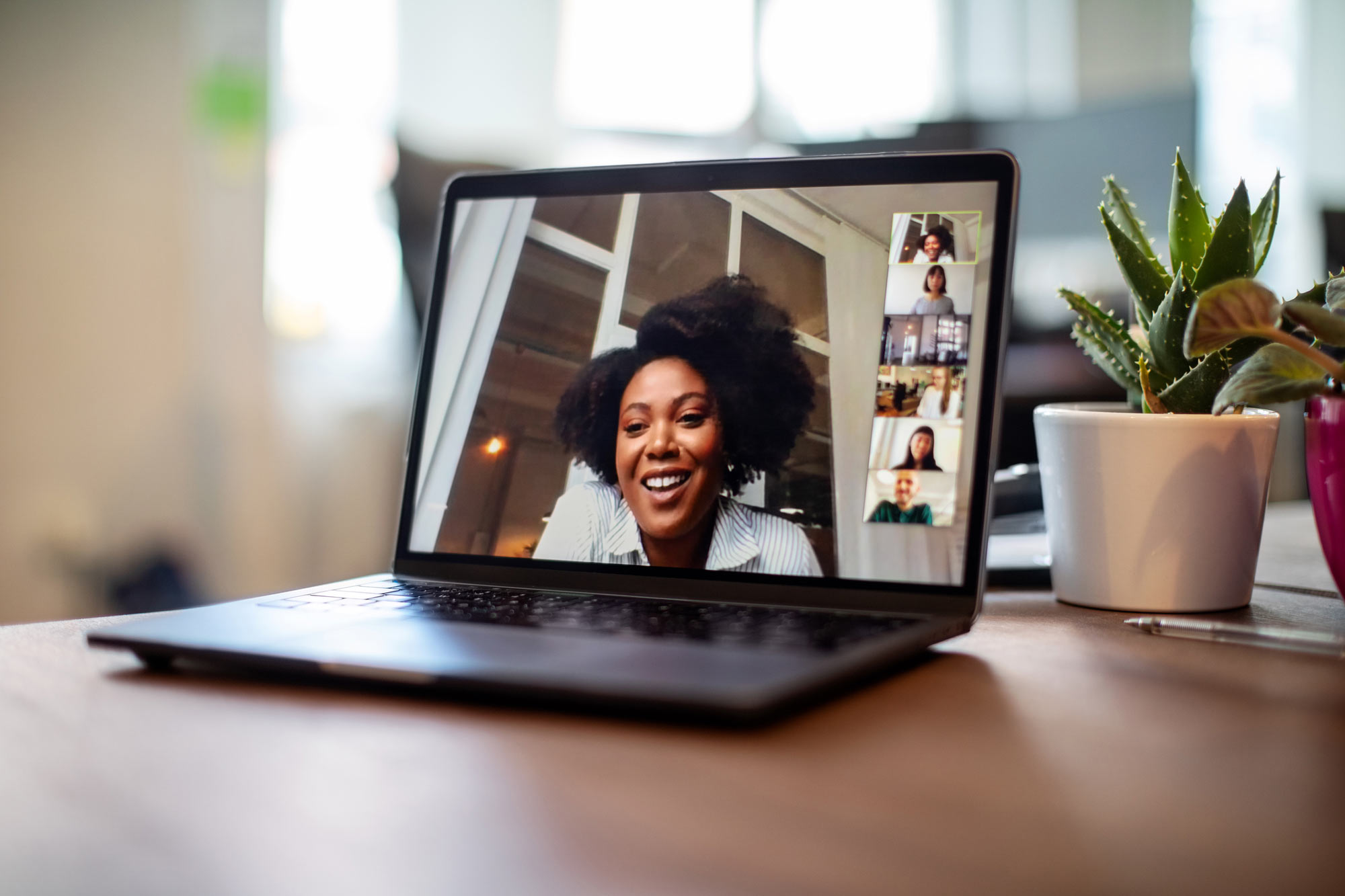 Remote team collaborating via video call