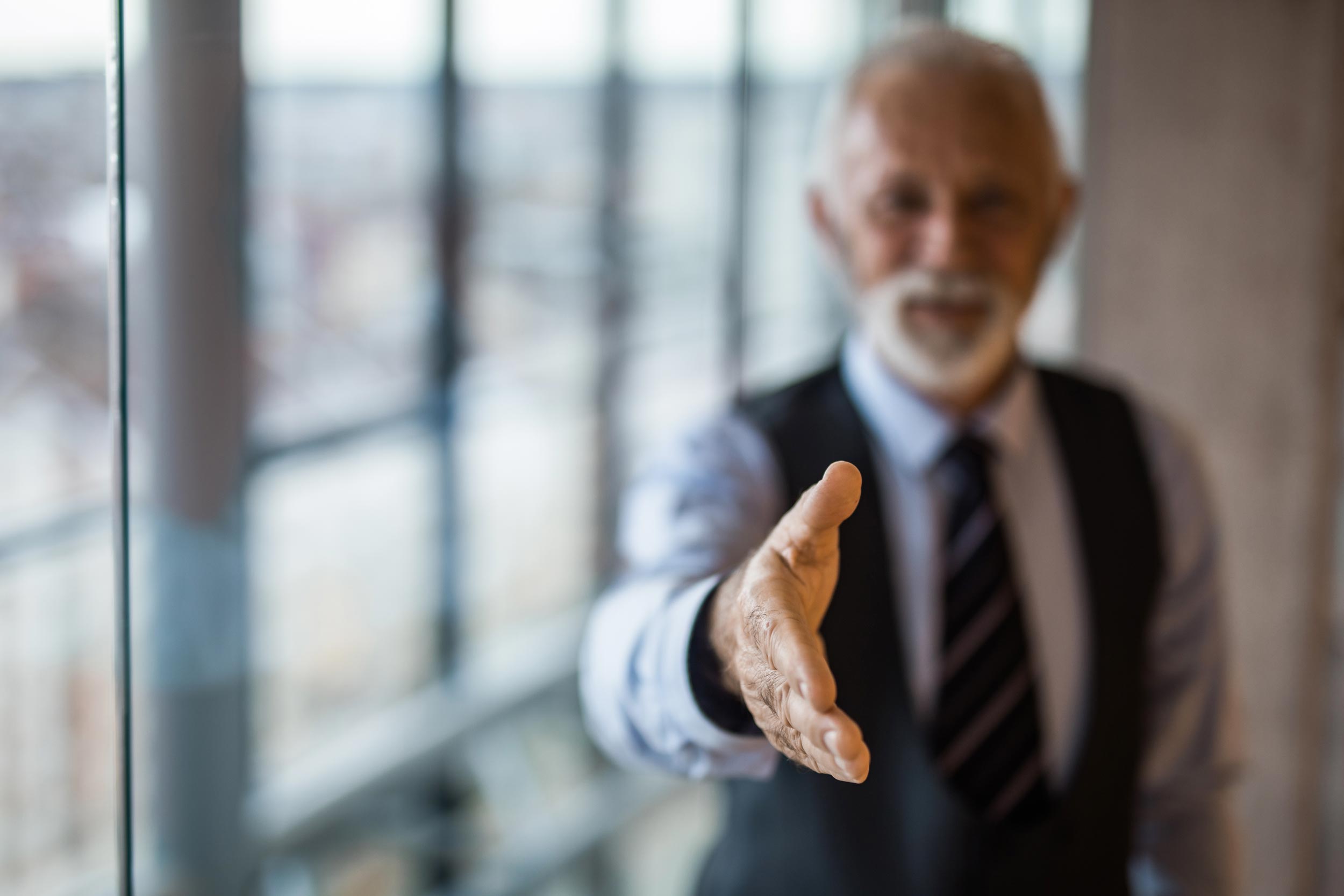 Business professionals shaking hands