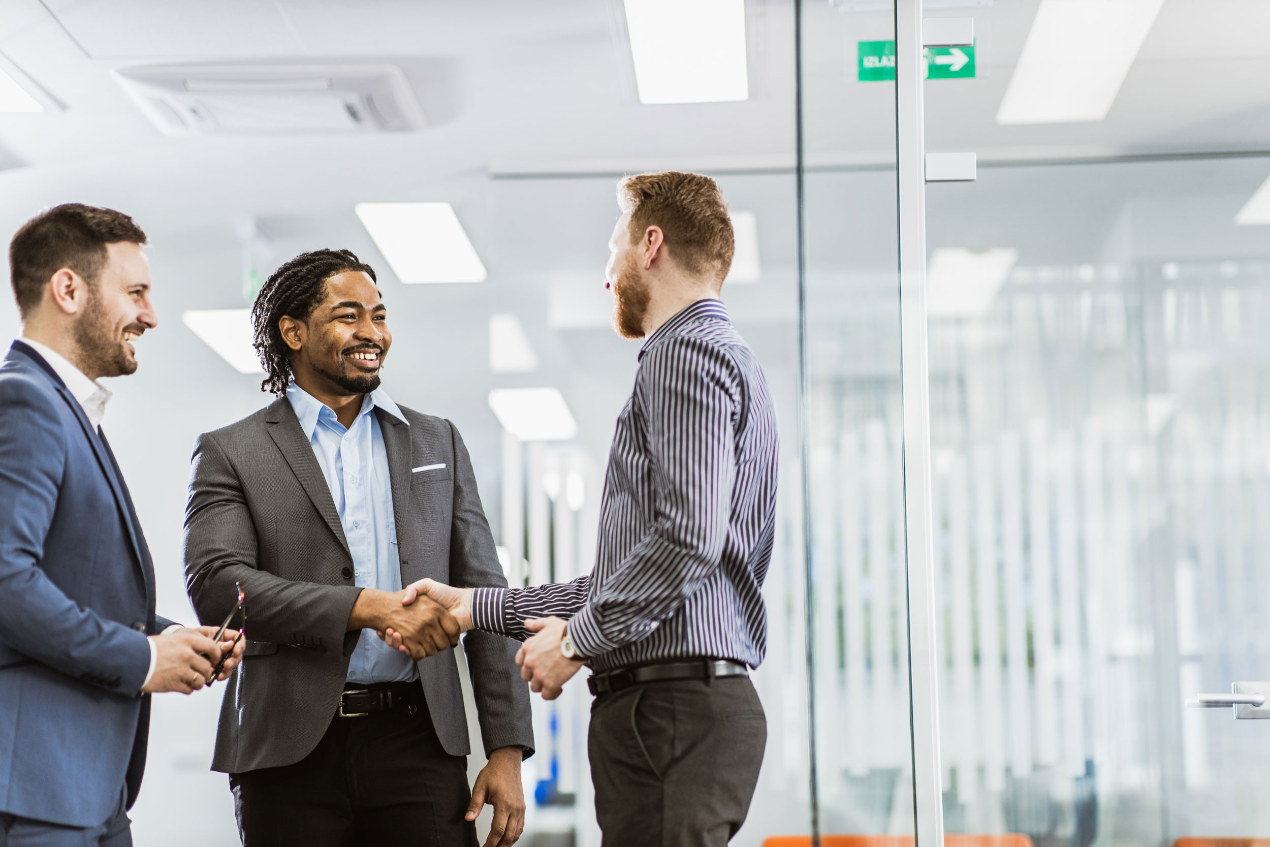 welcome handshake of business people in the office