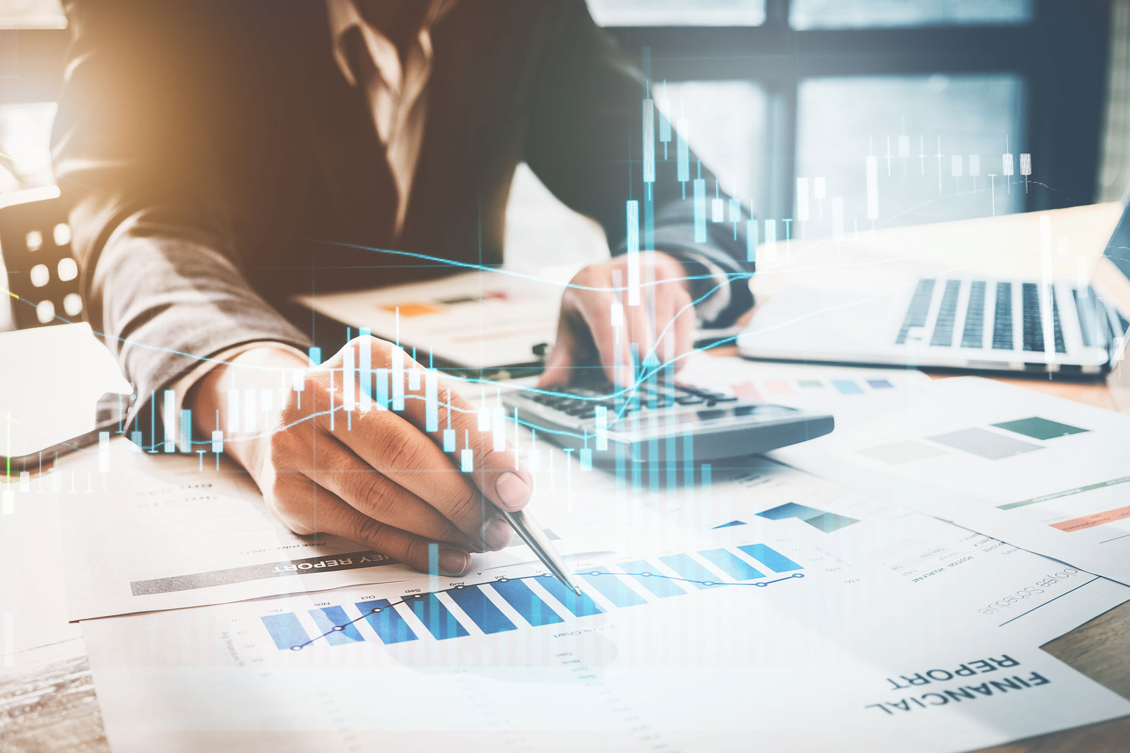 financial report with calculator and laptop