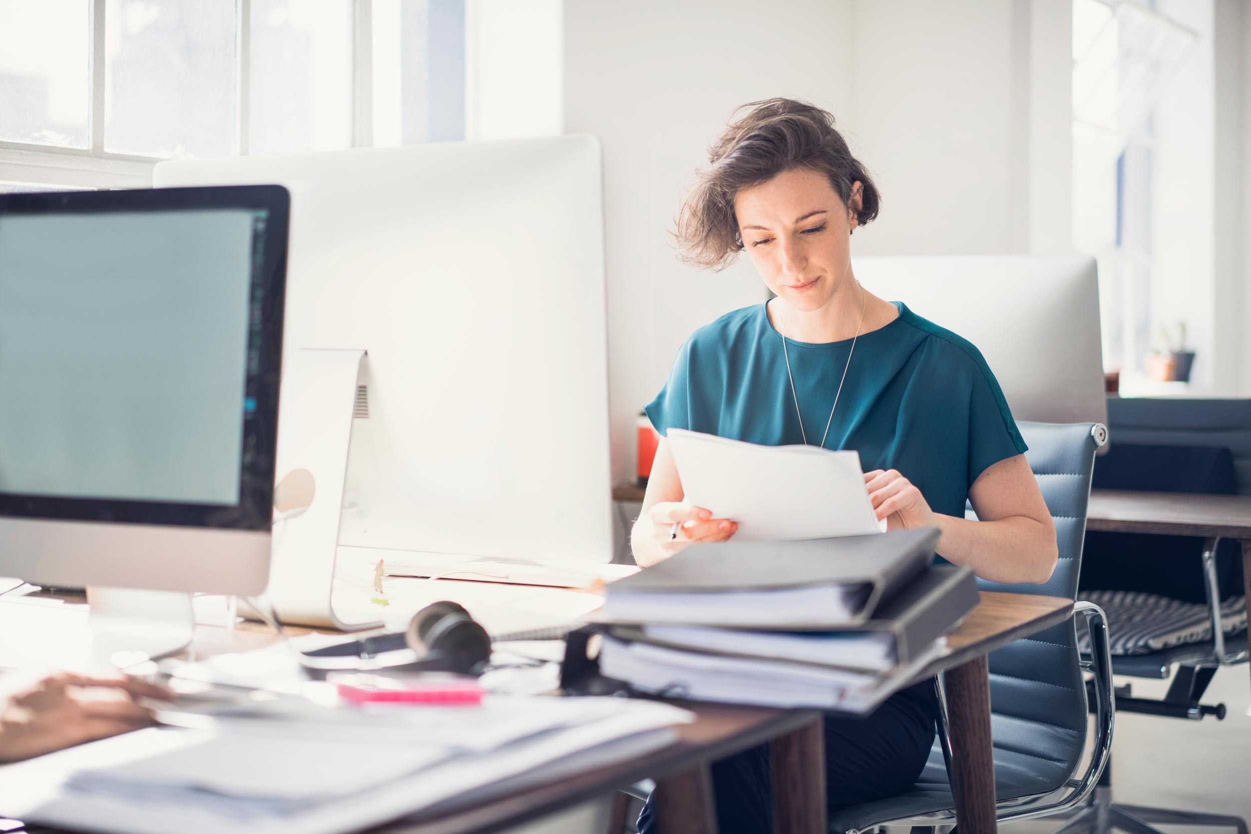 a corporate person working on the desk