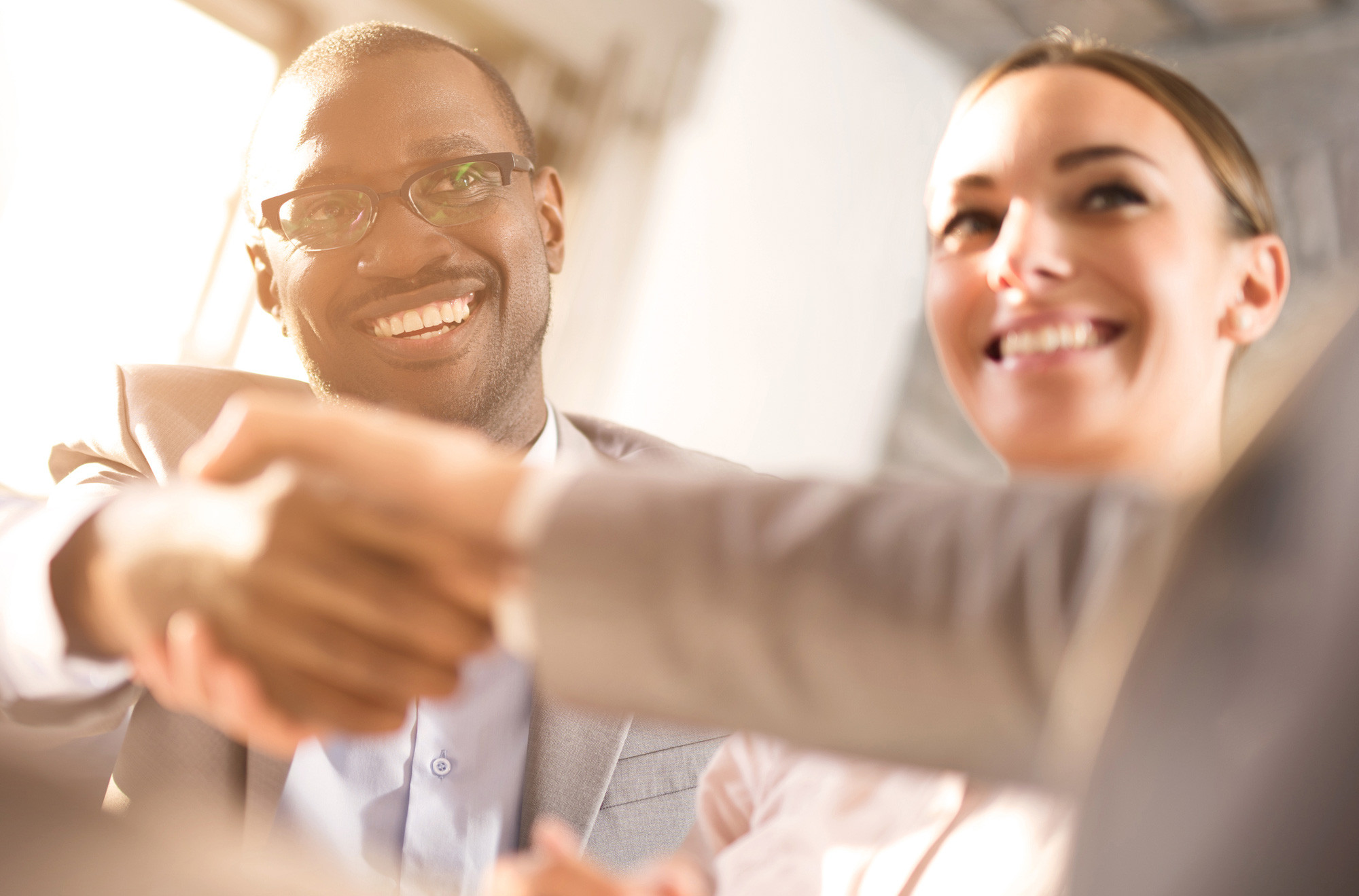 peoples shaking hands to each other