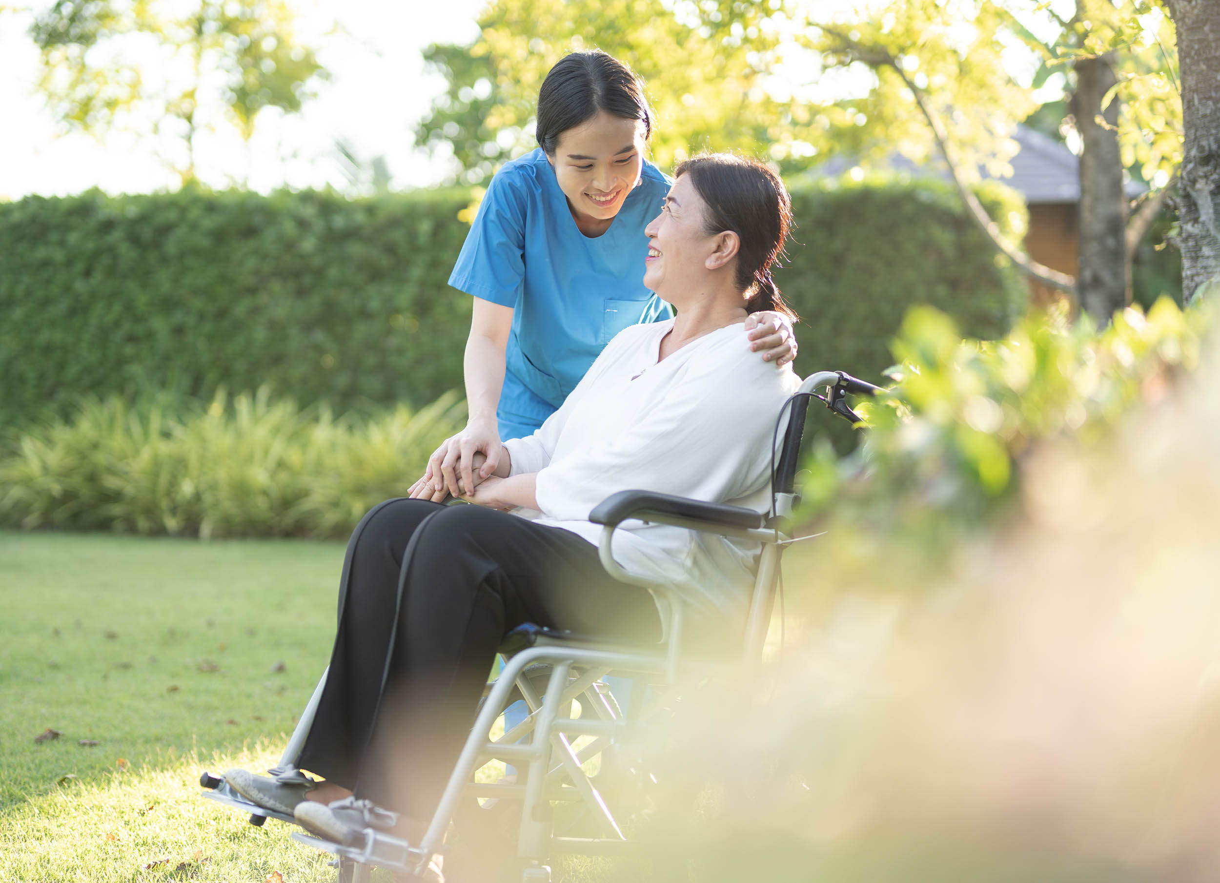 nurse taking care of older person at home