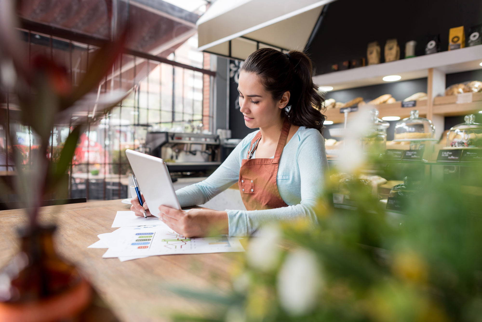 business owner working for papers at restaurant cafe