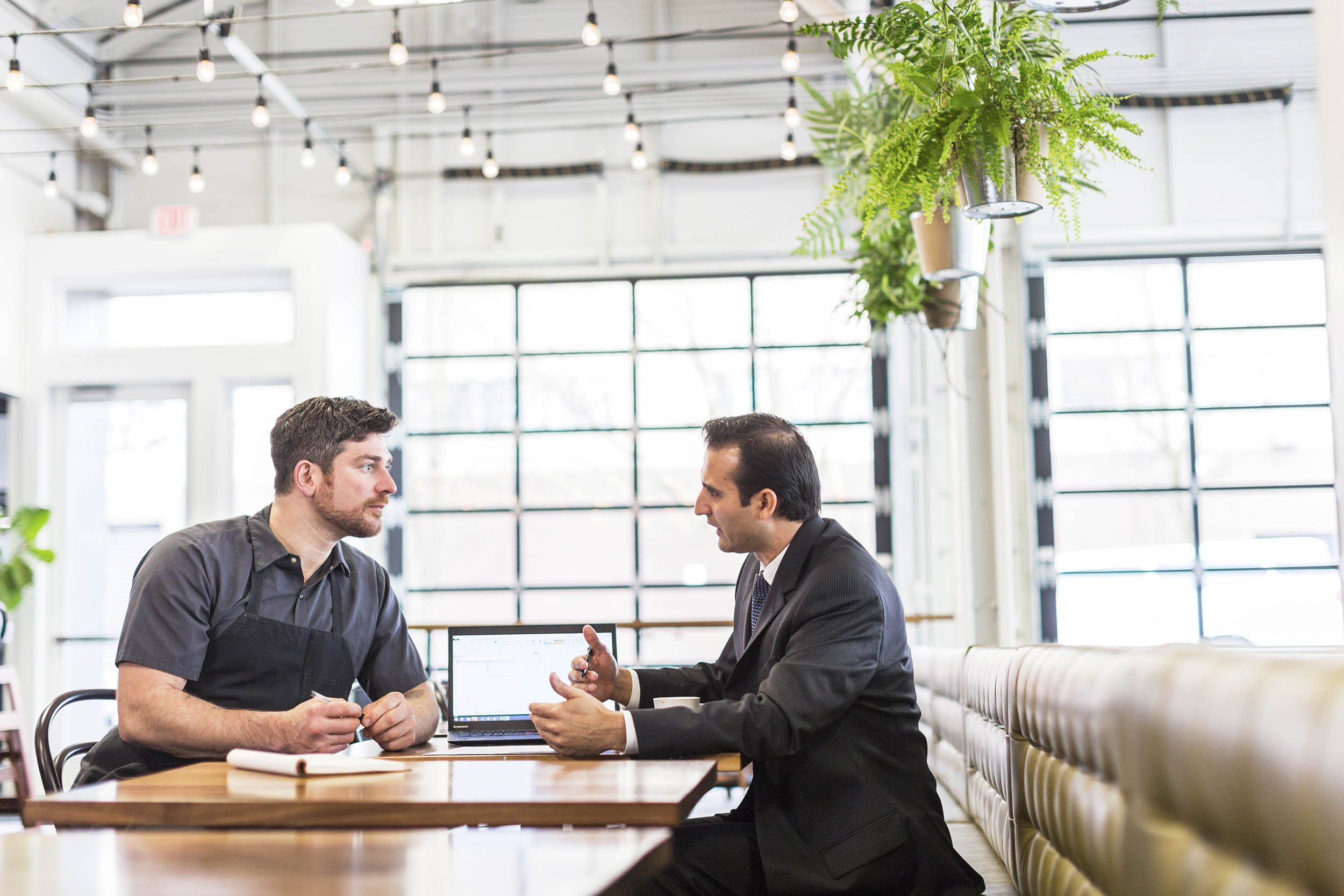 business person consultation with chief in restaurant