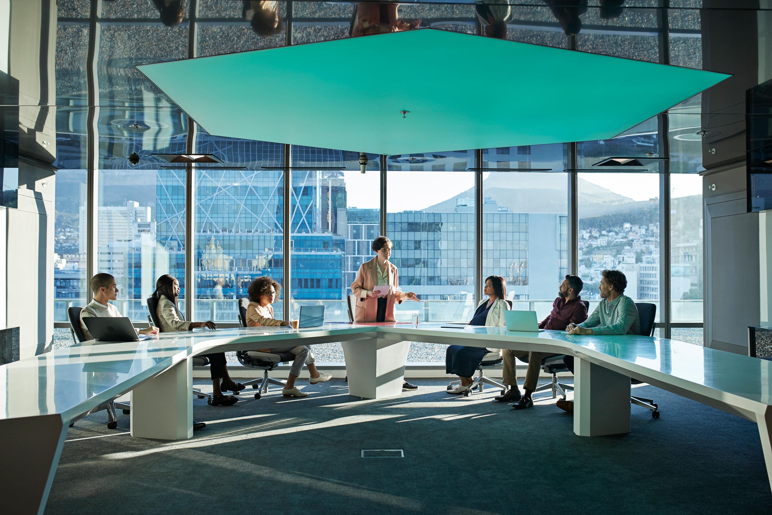 Colleagues discussing retirement strategies in a meeting room