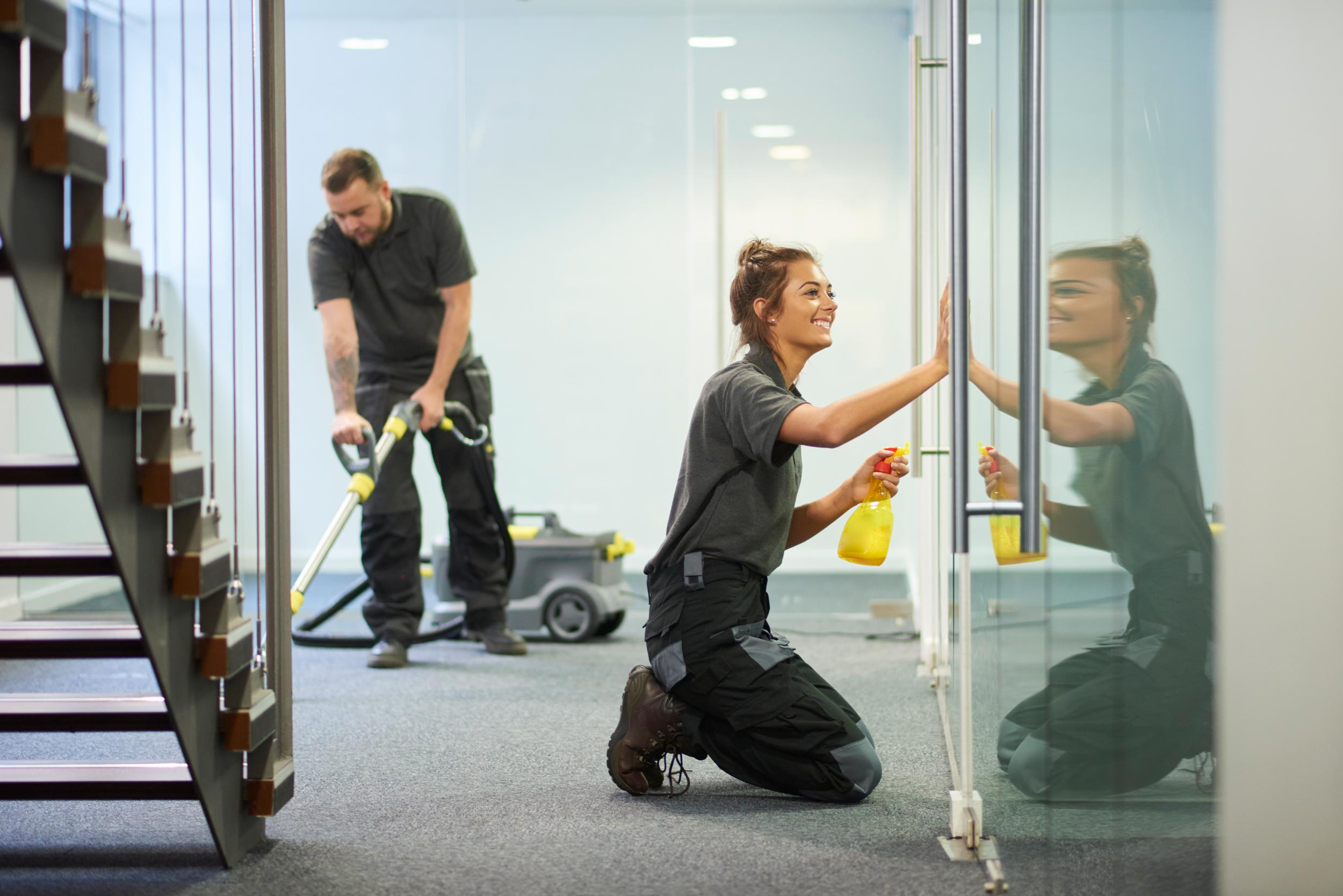 people with cleaning process in floor