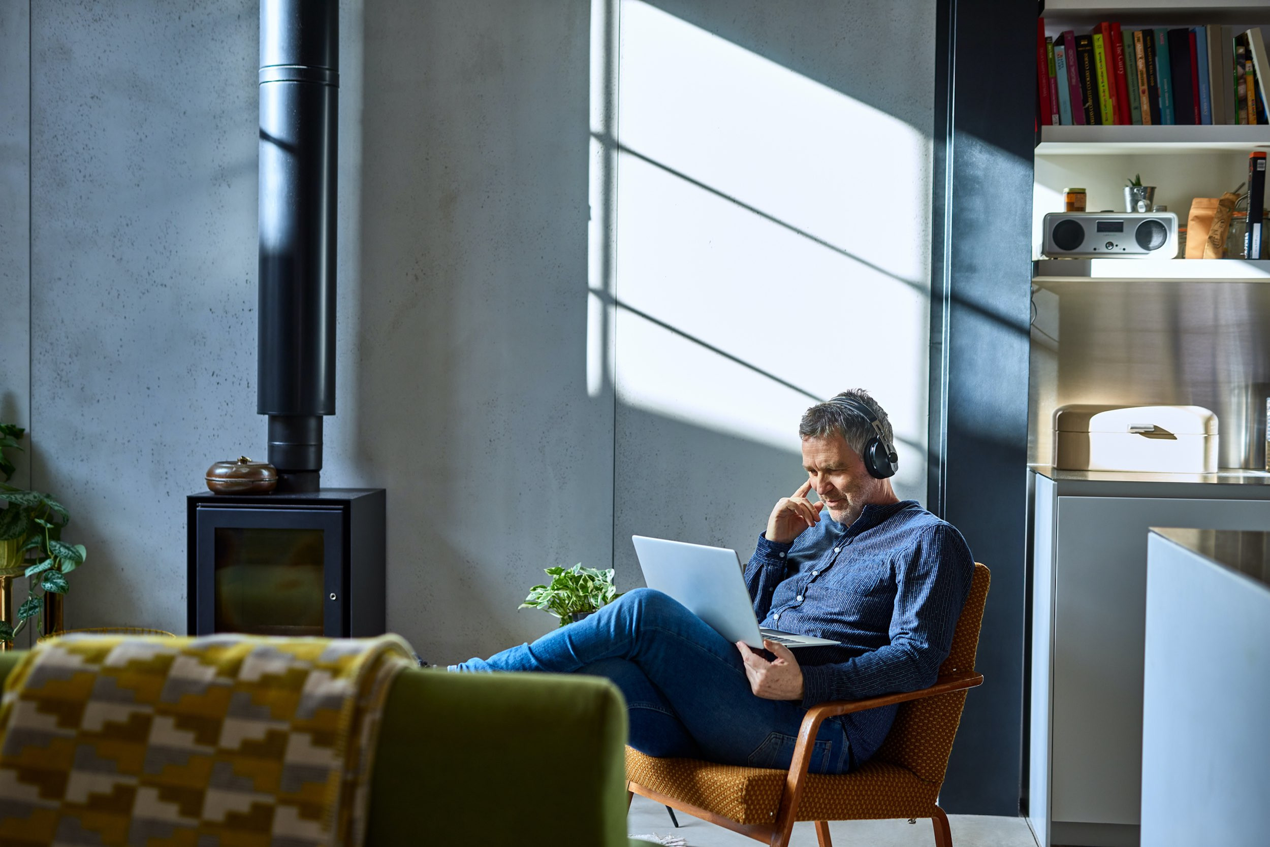 a business person sitting and working on laptop