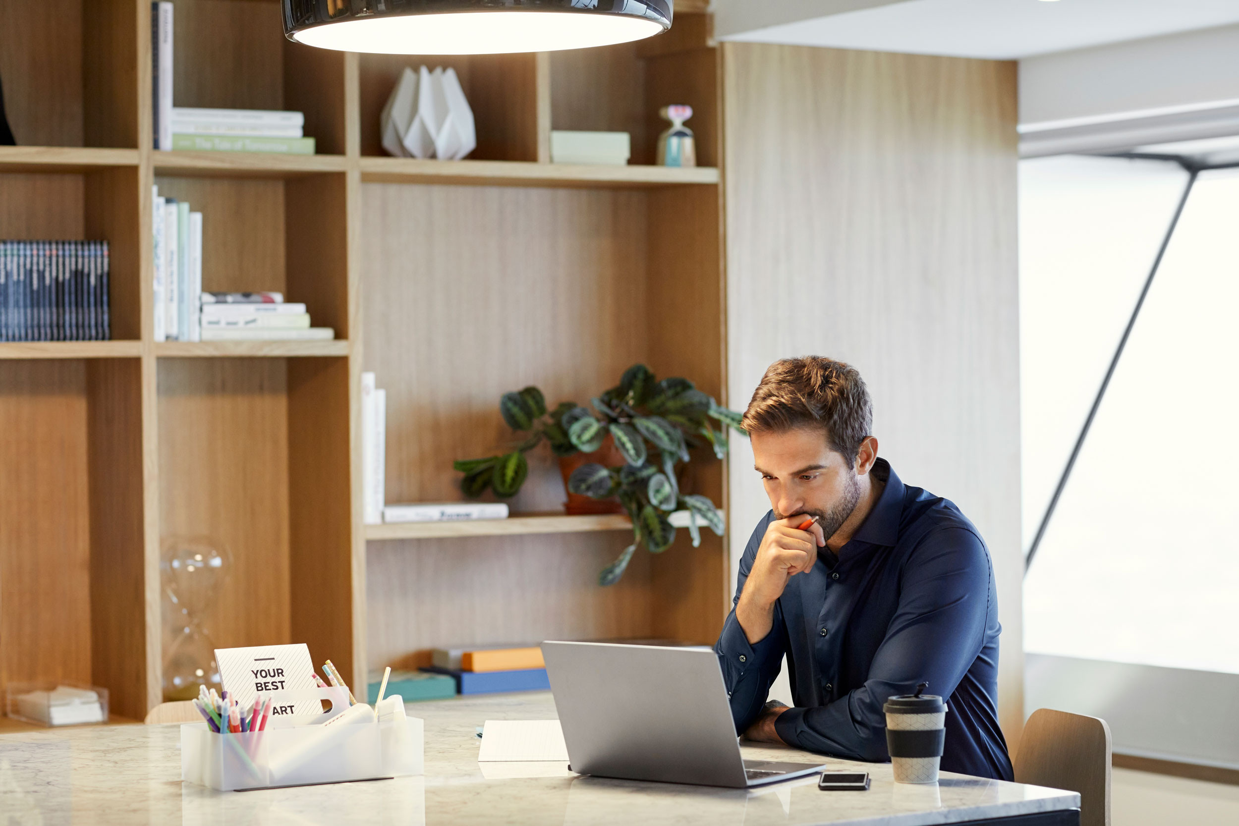 person working on computer at office