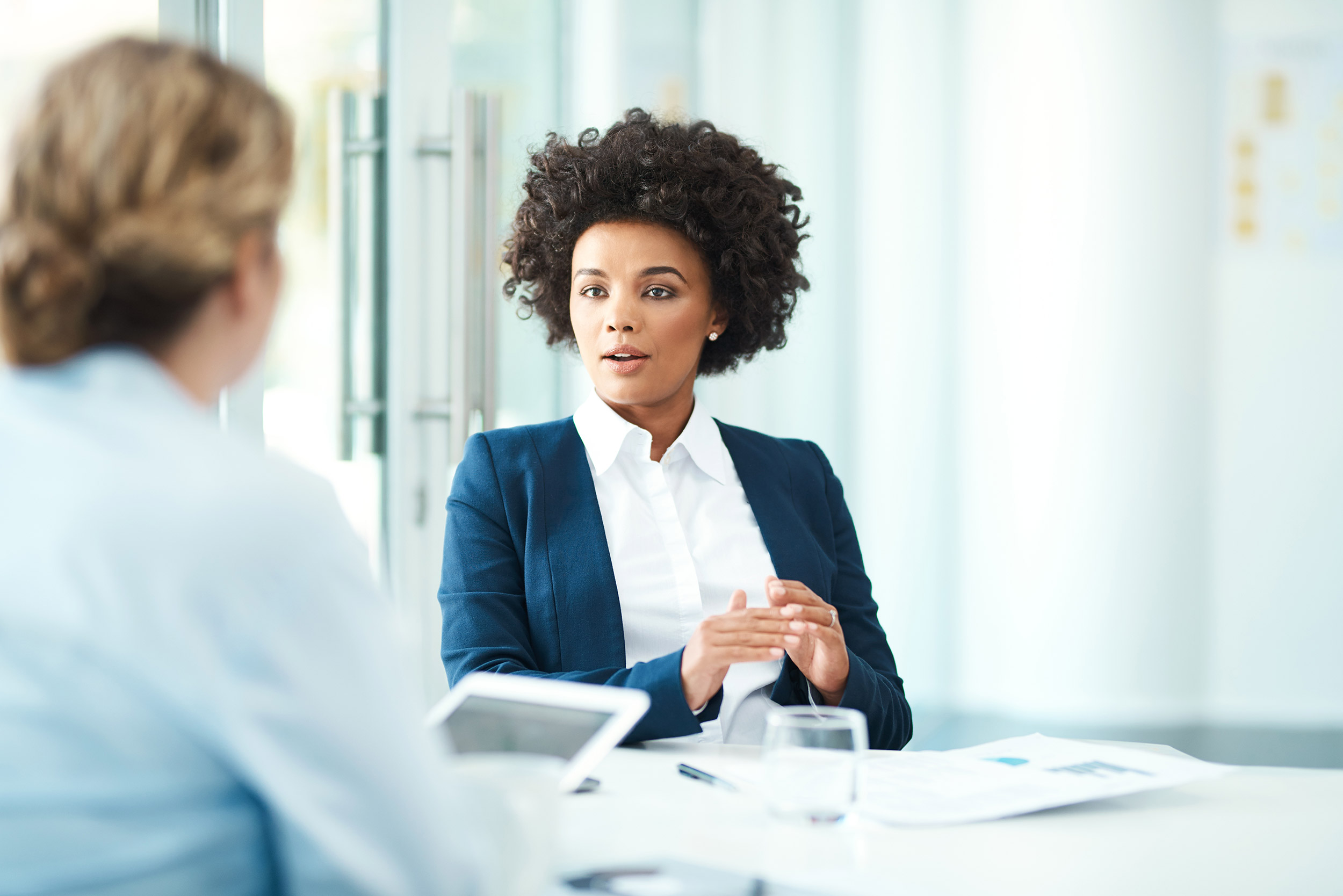 Tax professional consulting with business owner