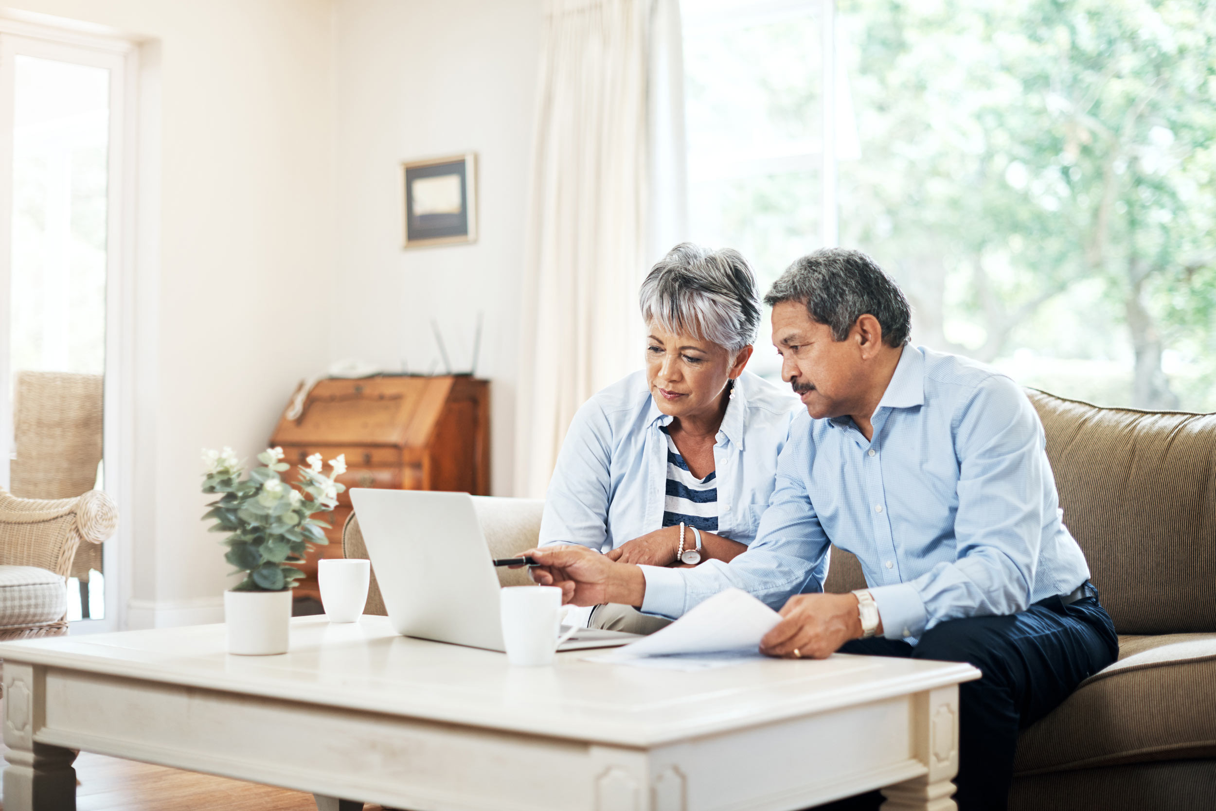 couple retirement planning with computer