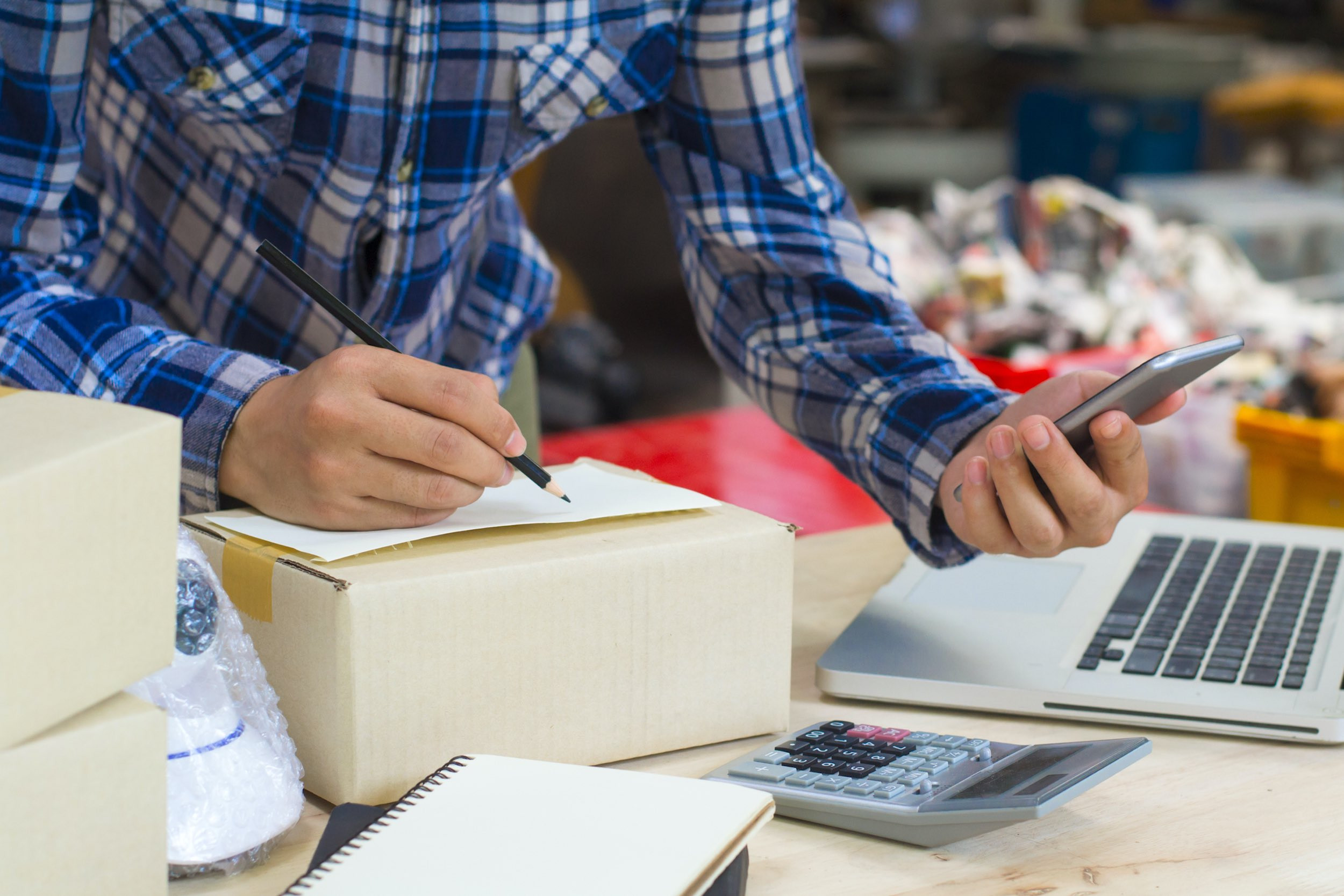 a person sending packages for business purpose