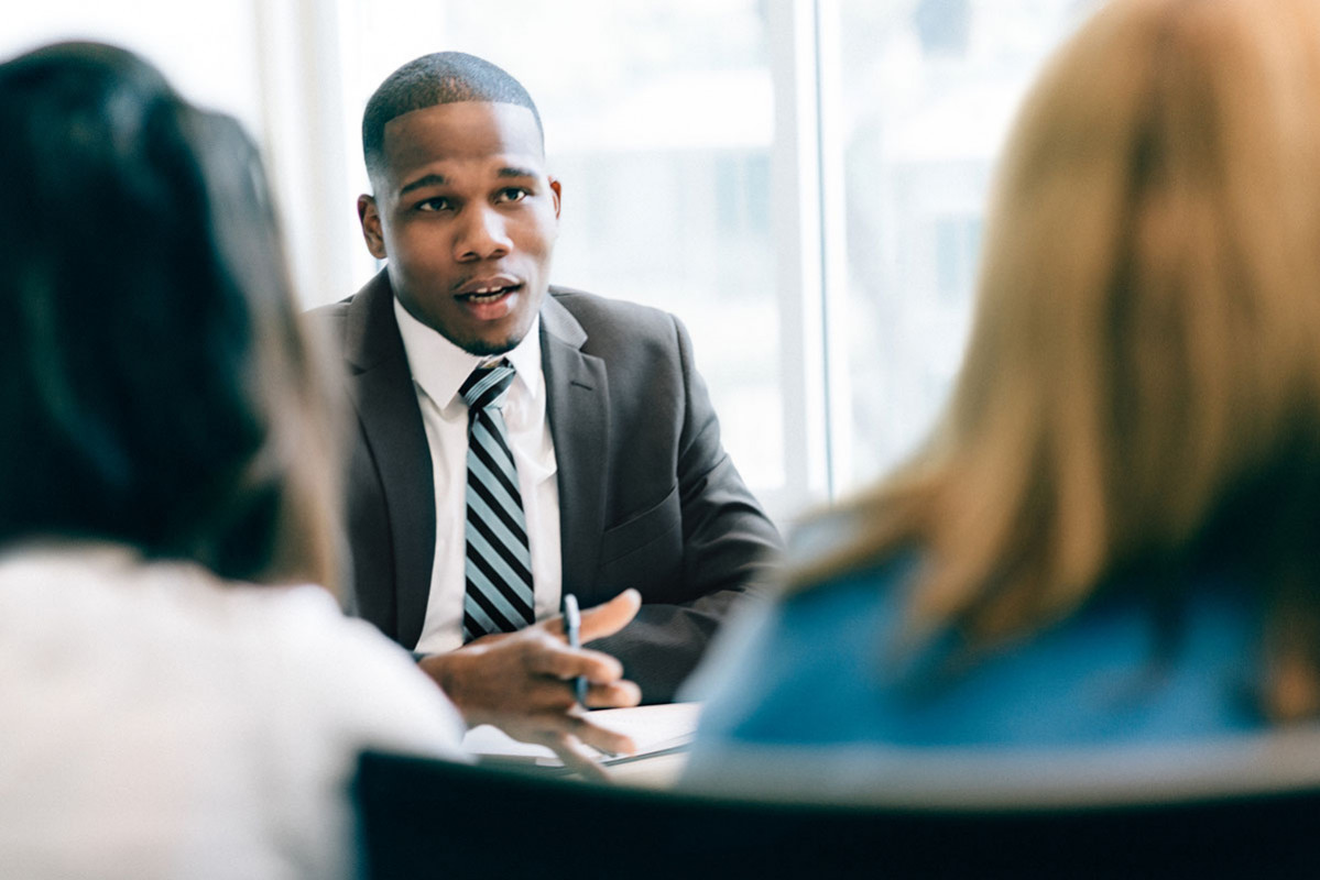 a person meeting with the couple