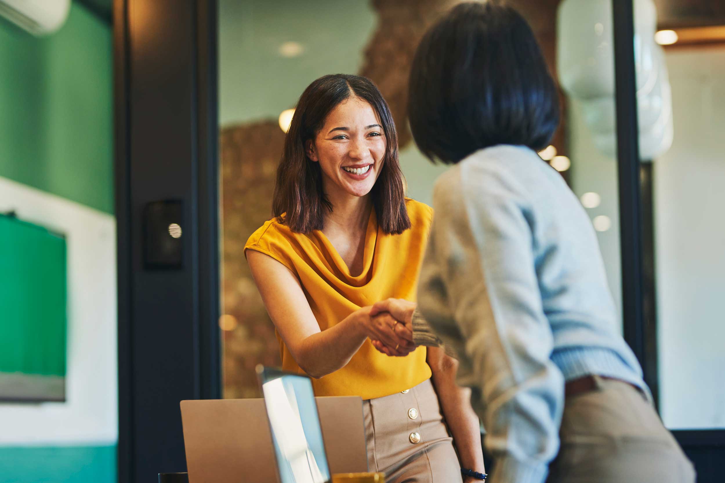 Professional handshake representing business trust