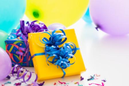 colorful gift boxes, balloons and ribbons