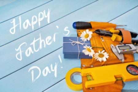 Happy Father's Day text with a tool belt and daisies
