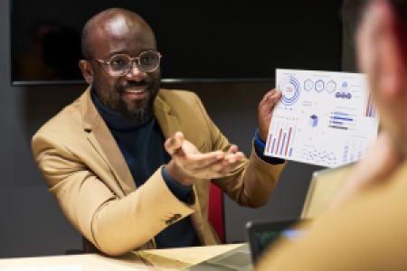 an accountant confidently discusses business performance