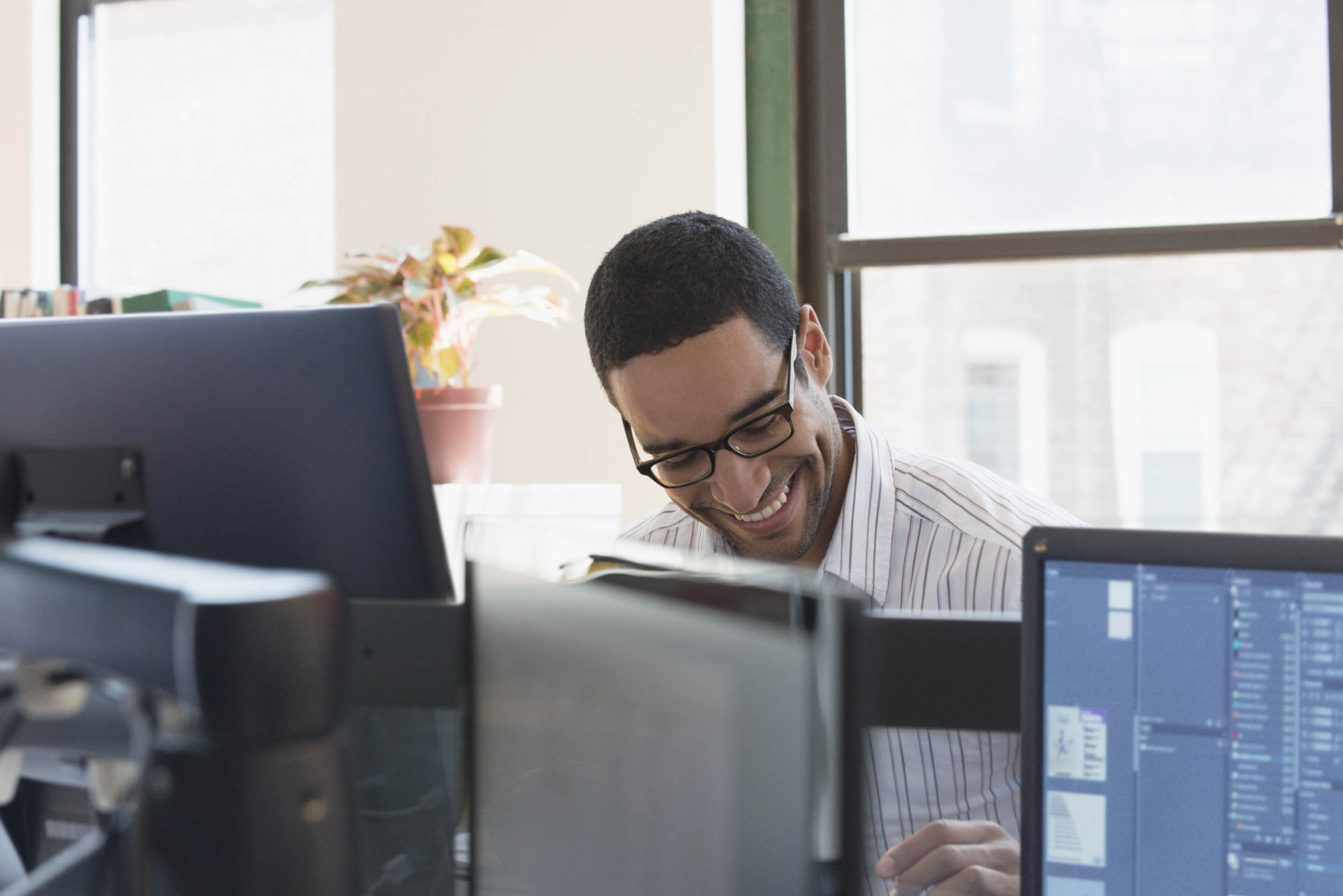 a happy businessperson working in the office